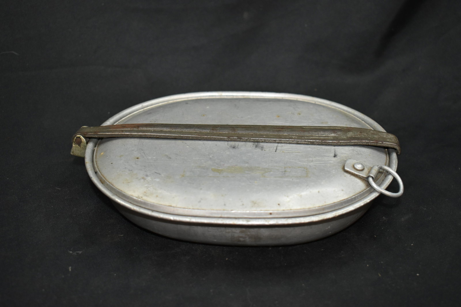 WW1 era Field Mess Kit: Contains a knife, fork and spoon. Would have been carried by soldiers during WW1 to warm up and eat food.