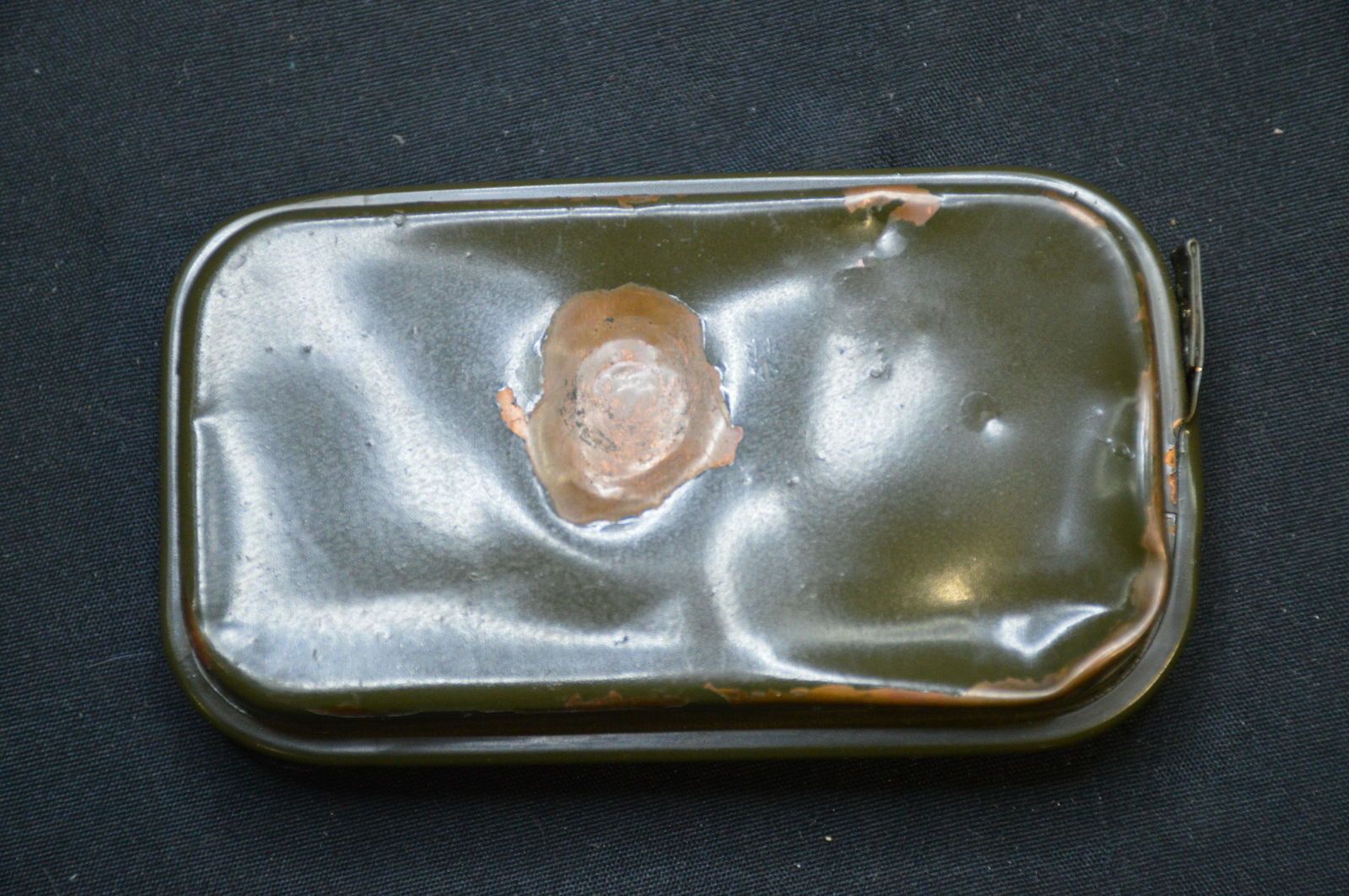 Metal First Aid Packet with Bullet or Shrapnel Damage (1 of 5)