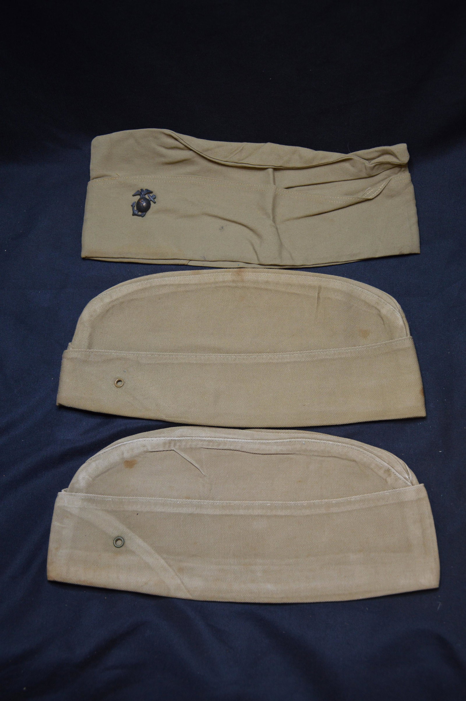 3 Marine Cap from the Korean War Era: Tan caps with one having a pin in it.