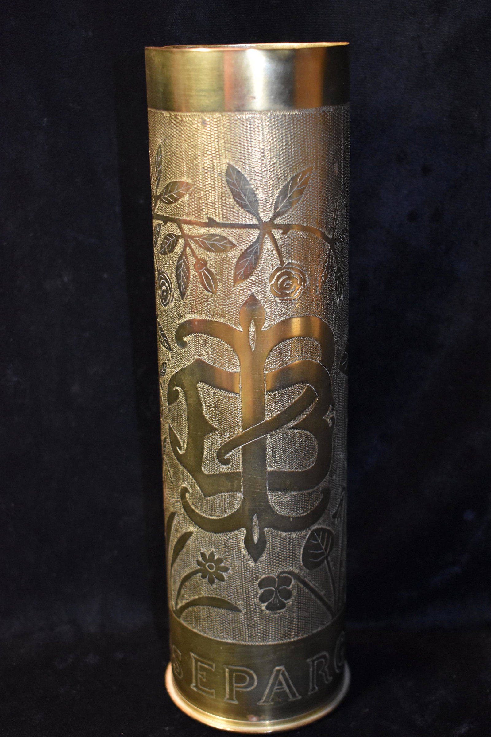WW1 Battle of LES EPARGUS 75MM TRENCH ART ARTILLERY: WW1 Battle of LES EPARGUS 75MM TRENCH ART ARTILLERY CASING. This piece commemorates the Battle of "LES PARGUS 1917". It is adorned with flowers, vines and a symbol we are not familiar with. Les Epargu