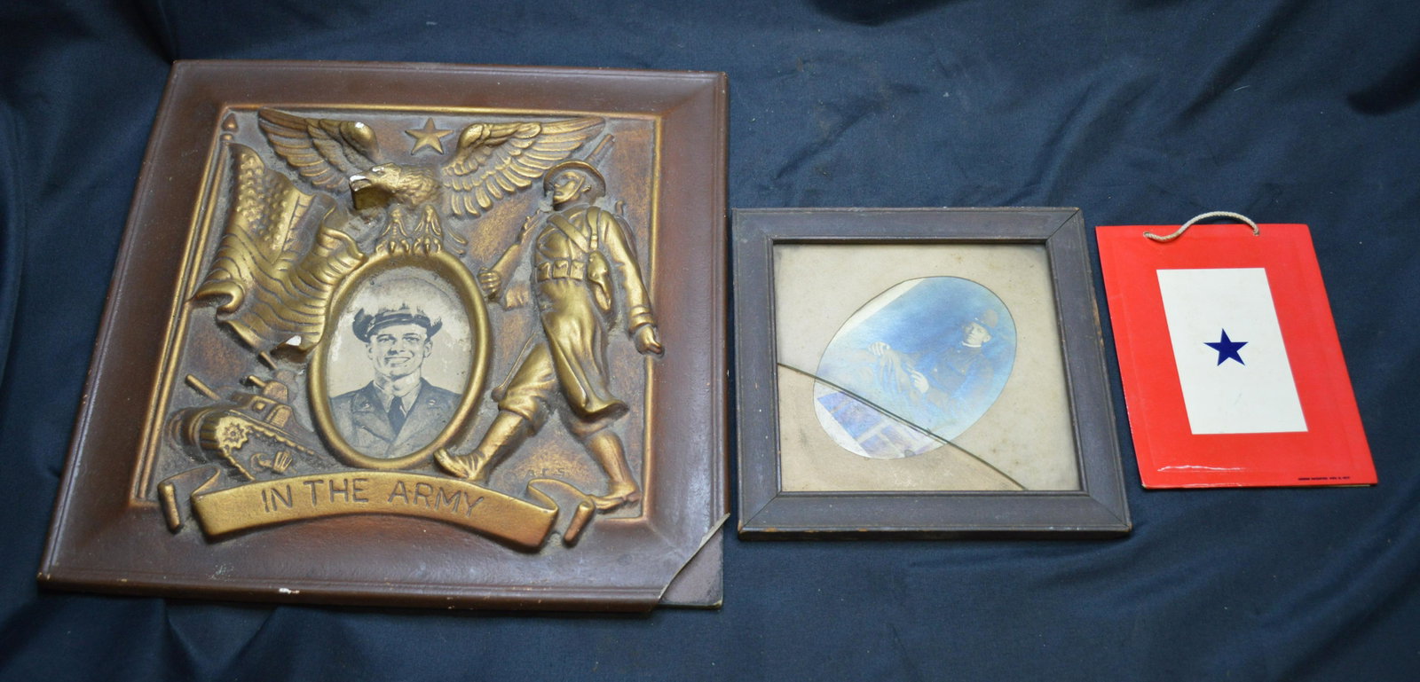 3 Pictures from WW1: The Star signifies that a family member was in WW1. The glass is broke on the soldiers photo. The chalk frame has one of the corners broke and missing.