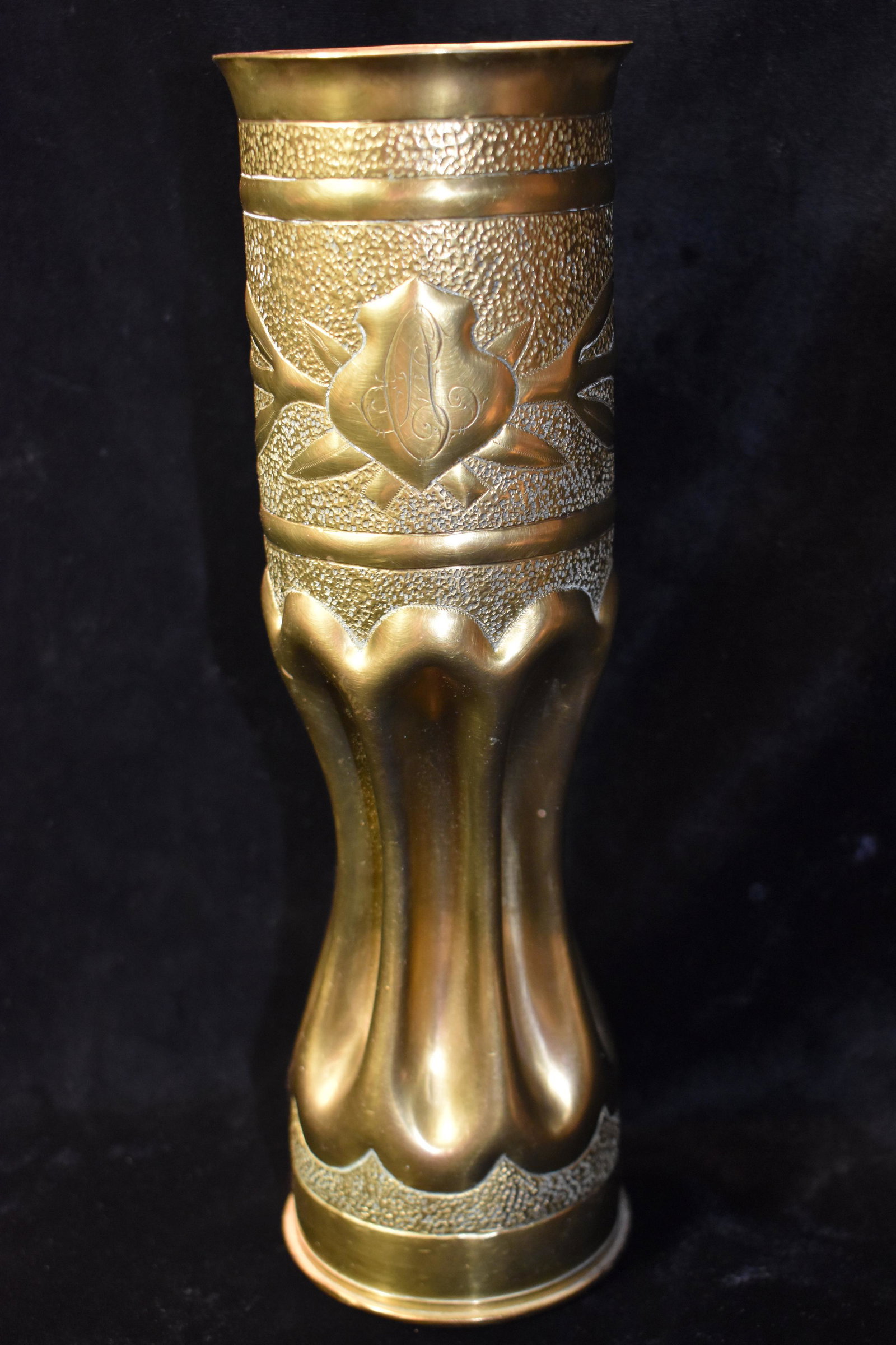 1917 WW1 Ornate 75MM Trench Art Casing w/ CA Initials: 1917 WW1 Ornate 75MM Trench Art Casing w/ CA Initials. This piece is elegantly crafted with the initials "CA" engraved in the center. This has all of the tucks and tricks incorporated in to the best t
