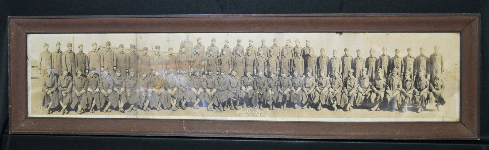 WW1 Framed Panoramic Picture: Machine Gun Co. 354th Infantry. 10 5/8 x 40 3/4 inches.