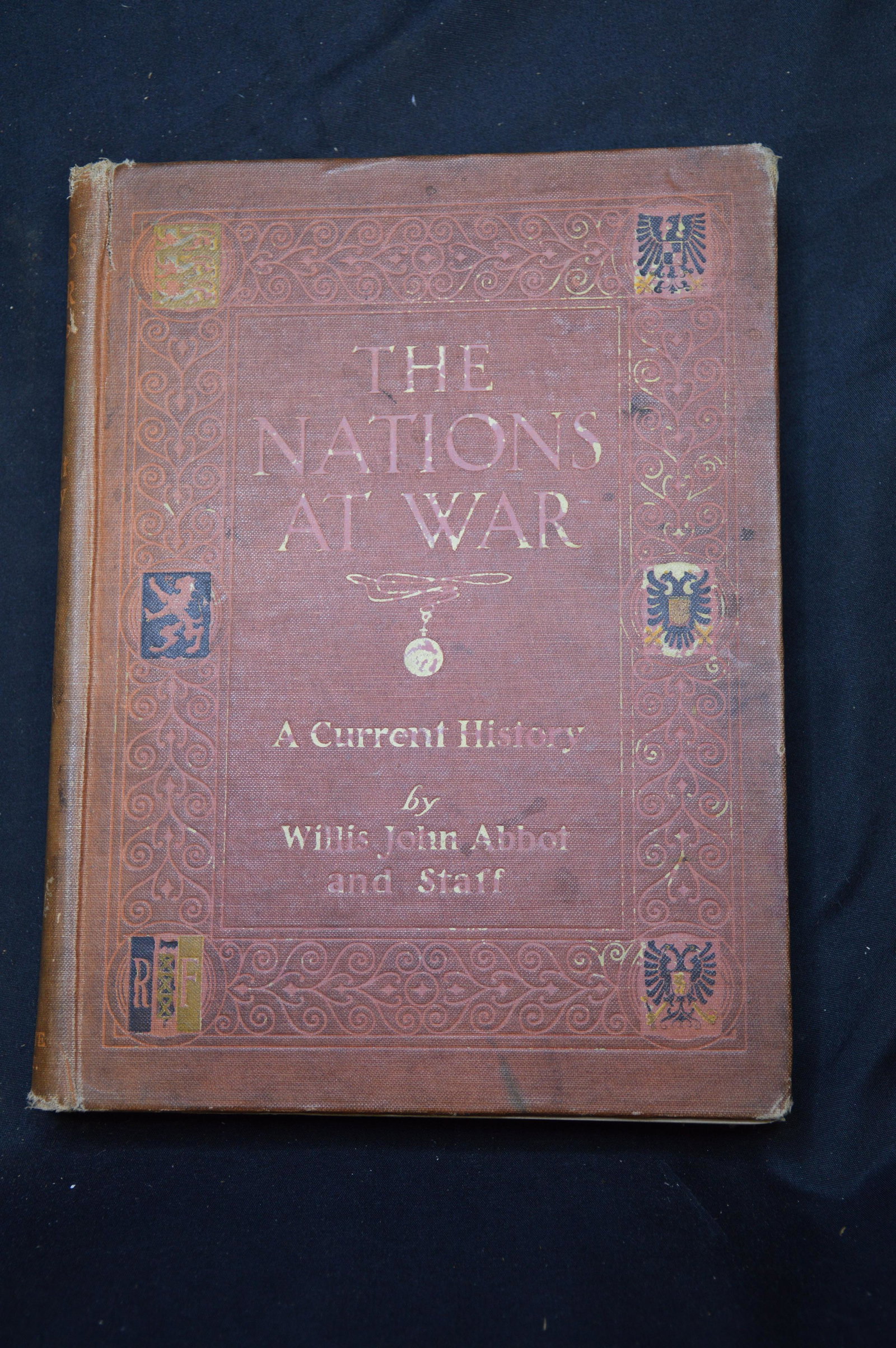 The Nations At War By Willis J. Abbot: Illustrated with many Plates in Full Color, Photograhps, Maps, Charts, and Diagrams. 366 pages. The book is in fair condition. Cover edge wear and a couple loose pages. The spine needs to be reglued.