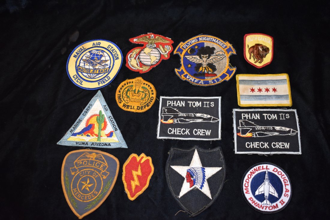 Military and Mcdonald Douglas Patch Collection: This lot consists of over 35 patches. Most are USMC, Police and McDonald Douglas patches with a few 1970's bowling patches. Largest patch is 6 1/2"