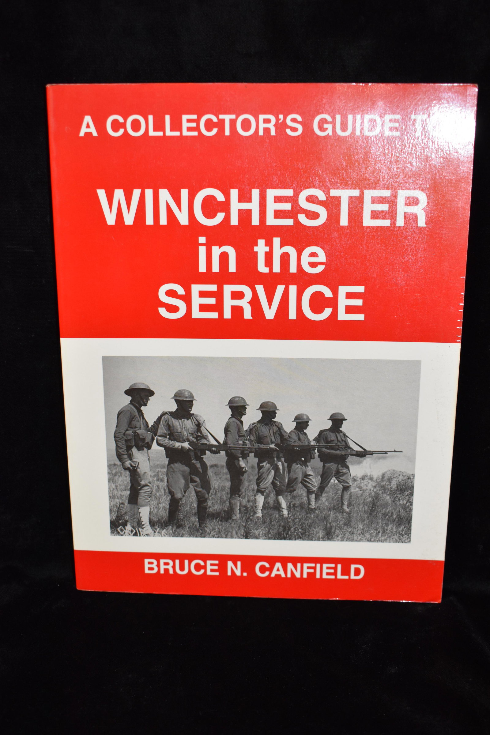 1997 Winchester in the Service: A Collector's Guide to Winchester in the Service by Bruce Canfield. Published by Andrew Mowbroy 1992. Excellent condition softback. 185 pgs. 10 3/4" by 8 1/4"