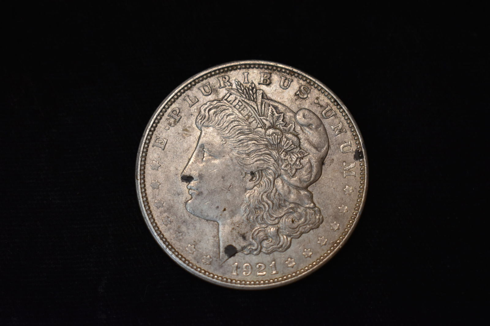 1921 Morgan Silver Dollar: 1921 Morgan Silver Dollar. Very Good Condition.