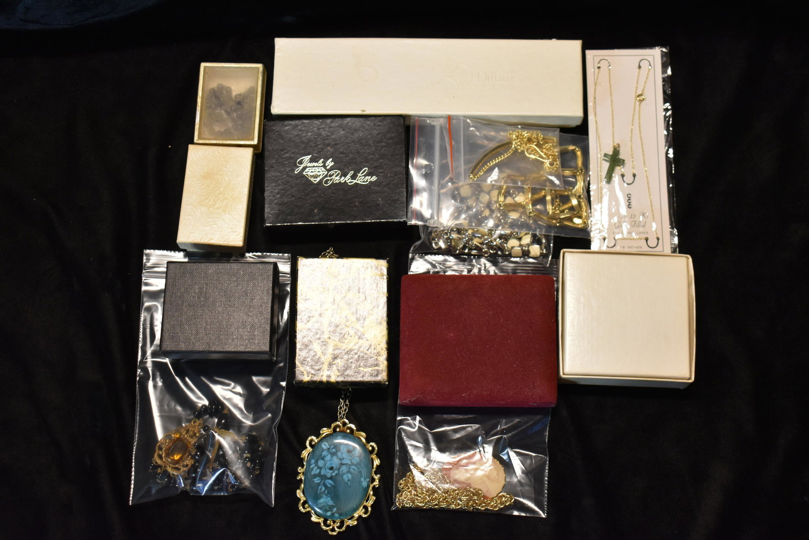 16 Piece Jewelry Lot Necklaces, Bracelets, Earrings: Quality varies from nicely worn to new. 12 Necklaces, One Rosary, 2 Bracelets and a pair of matching earrings that goes with the black bead set. The necklace on the far right is one exception on clean