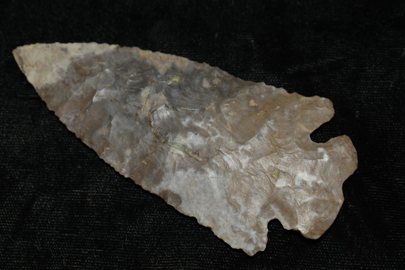 3 5/8" Ohio Flint Ridge Dovetail Arrowhead: 3 5/8" Ohio Dovetail found in Warren County, Ohio by James Miracle. There is a seam in this stone which is typical on flint ridge which may also be where it was glued together. It does not stand out. 
