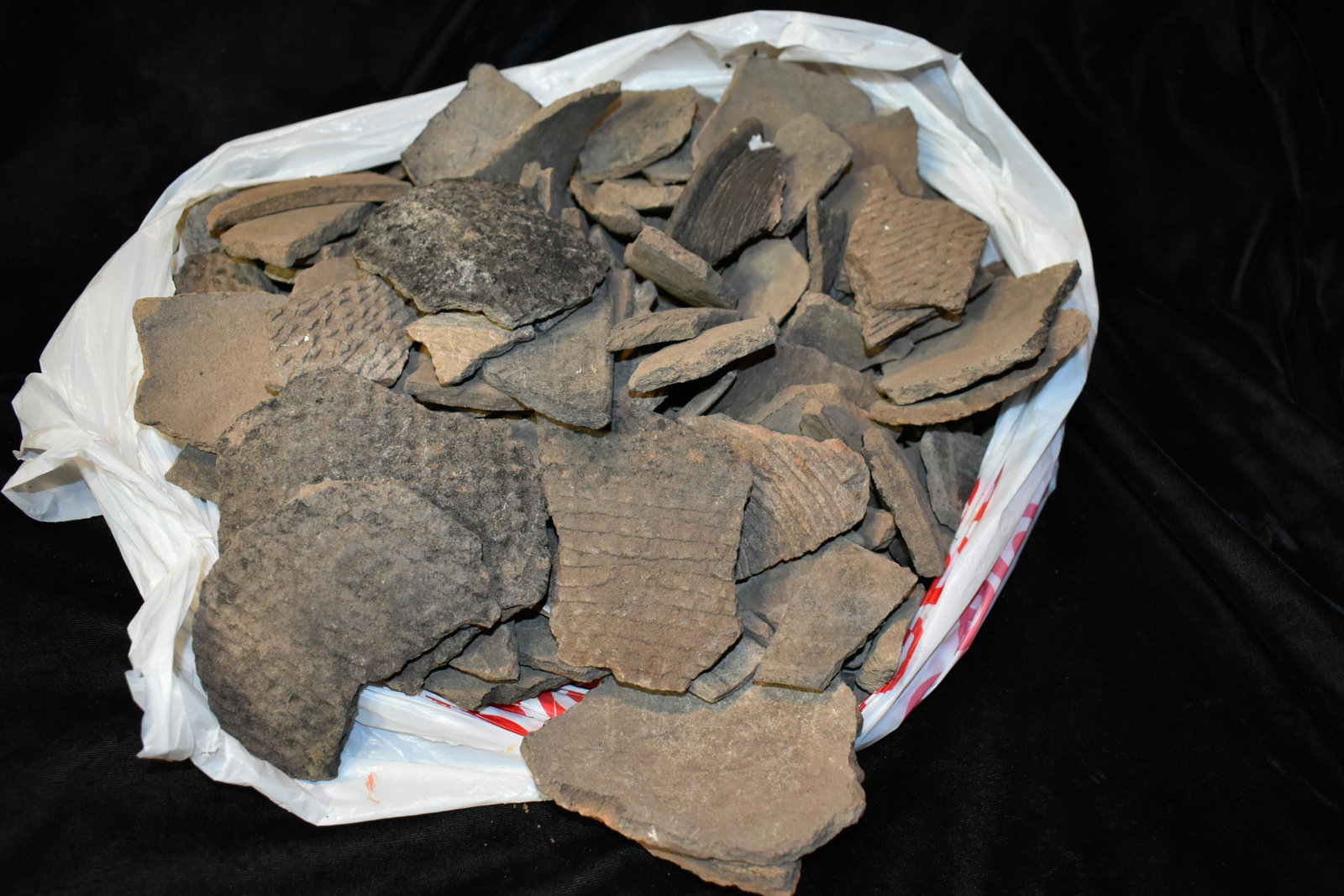 Large Pile of SW United States Pottery Shards. Many shards off the same pots.: Large Pile of Pottery Shards. Many shards off the same pots. Many pieces matching from different pots. Could be close to a whole pot or more in this pile. Like a jigsaw puzzle scrambled from several p