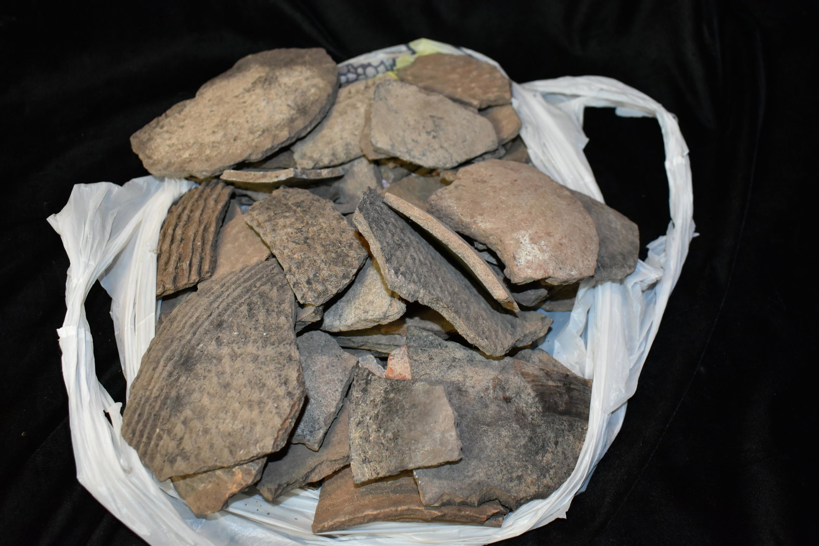 SW United States Native American Sack Pot Matching pieces to at least 2 pots: SW United States Sack Pot. Matching pieces to at least 2 pots. Many pieces matching from different pots. Could be close to a whole pot or more in this pile. Like a jigsaw puzzle scrambled from several