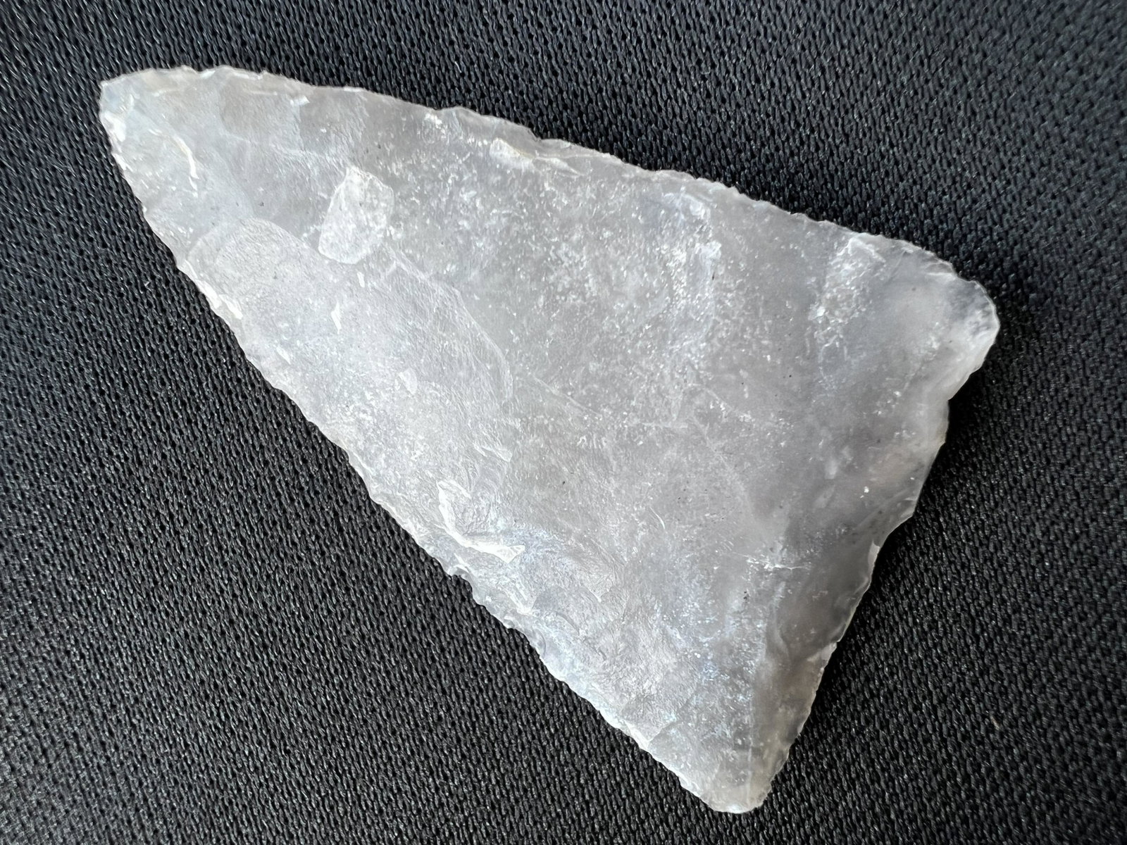 1 11/16" Translucent Texas Triangle. Ex: Ben Winchester Museum Collection.: 1 11/16" Translucent Texas Triangle. Ex: Ben Winchester Museum Collection. Ancient prehistoric authentic native american artifacts.