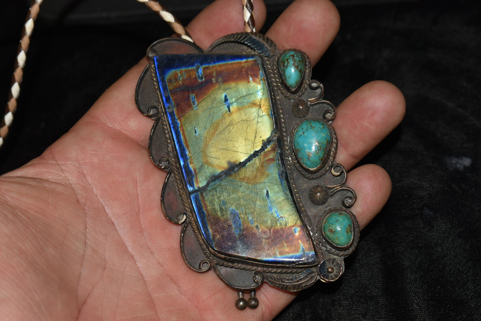 HUGE Old Pawn Bennett Navajo Labradorite, Turquoise and Sterling Silver Large Bolo (100 Grams): HUGE Old Pawn Navajo Labradorite, Turquoise and Sterling Silver Large Bolo (100 Grams). Had trouble identifying the large dark stone. We believe it is Labradorite When you angle it this one way it giv