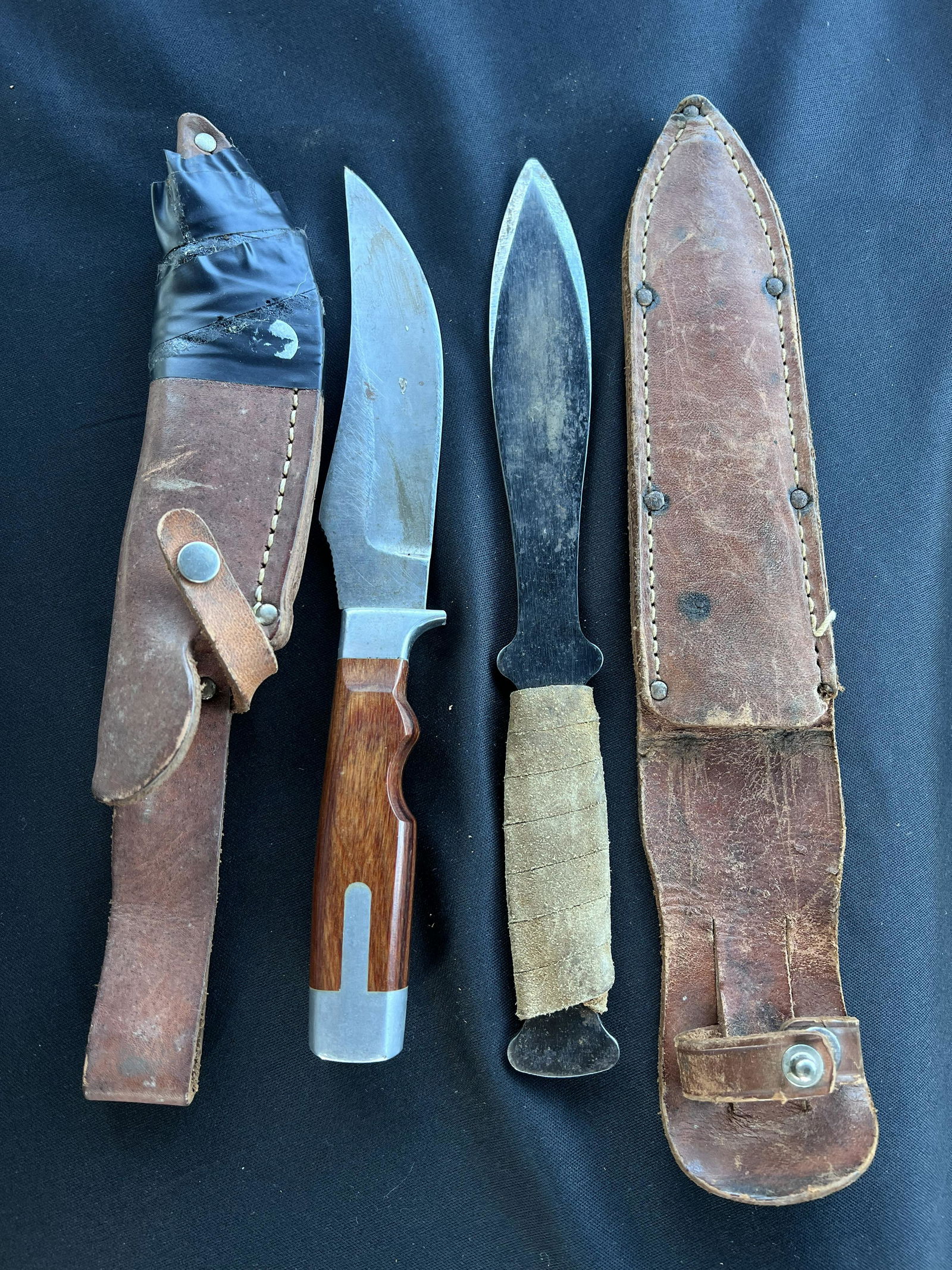 2 Fixed Blade Knives in Sheaths. Olsen OK 708 and a dagger with no information on it. Longest: 2 Fixed Blade Knives in Sheaths. Olsen OK 708 and a dagger with no information on it. Longest measures 9 7/8 inches.