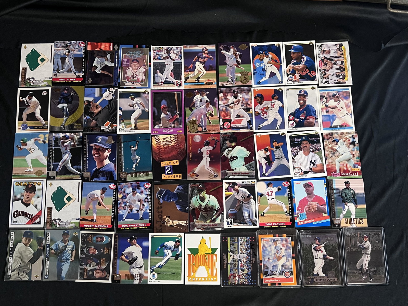 Group of 50 Baseball Cards. Includes Rookies of Vladimir Guerrero, Andruw Jones, Johnny Damon and: Group of 50 Baseball Cards. Includes Rookies of Vladimir Guerrero, Andruw Jones, Johnny Damon and Billy Wagner. Also includes Will Clark, Don Mattingly, Bo Jackson, Derek Jeter, Chipper Jones and many