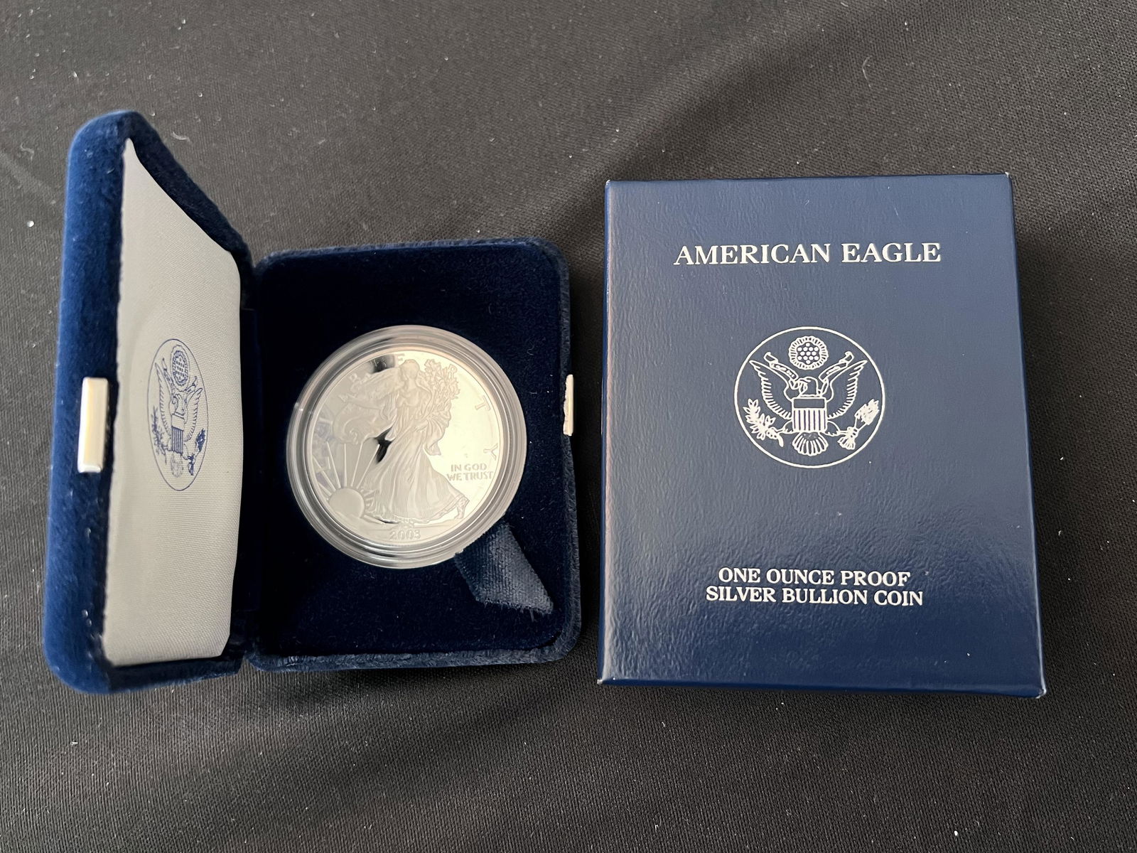 2003 American Eagle Silver Dollar Uncirculated Mint. In the original box and case. 1 ounce of: 2003 American Eagle Silver Dollar Uncirculated Mint. In the original box and case. 1 ounce of pure silver.