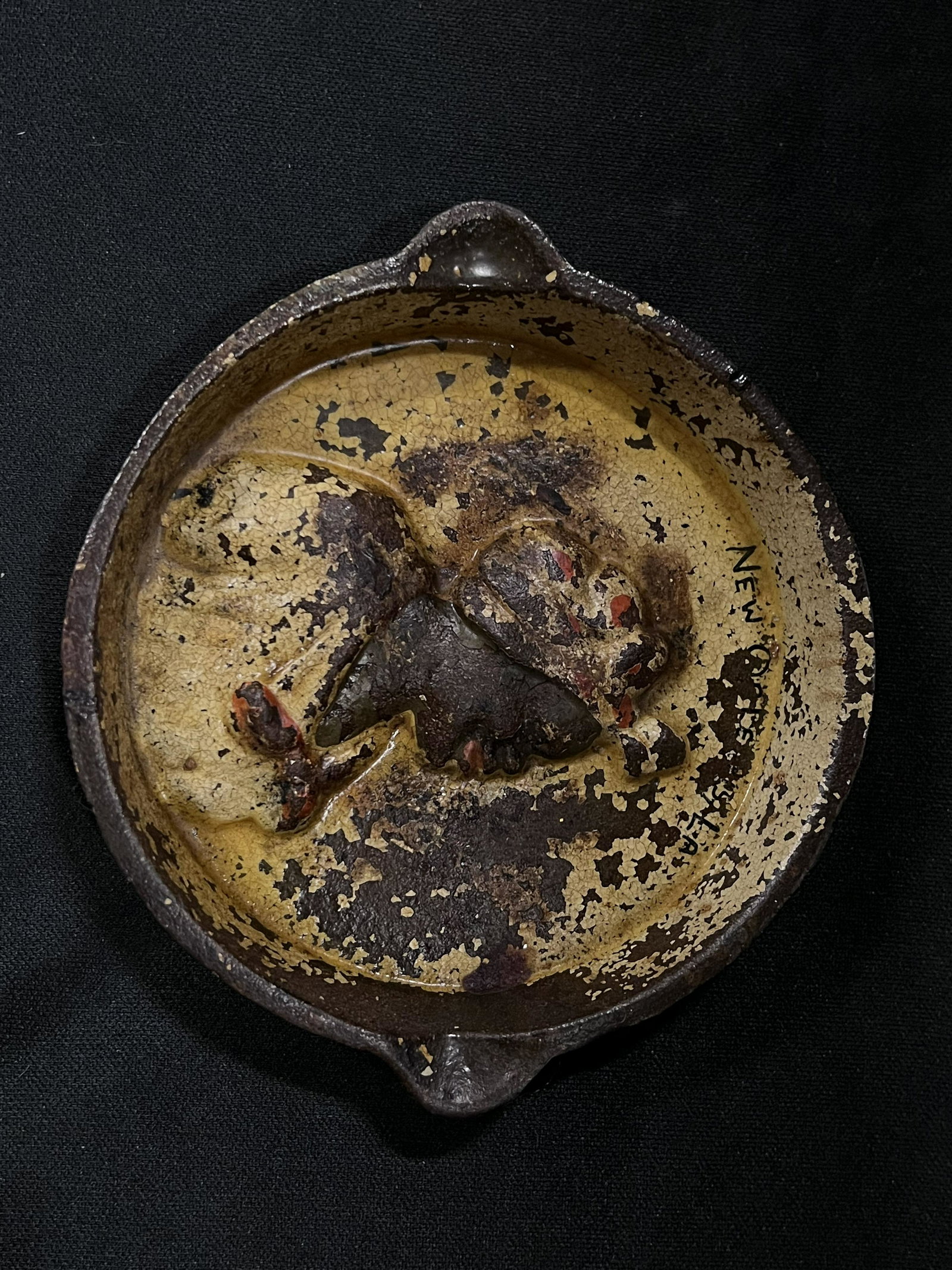 Black Americana Aunt Jemima Small Cast Iron Pan: The handle was ground off to turn it into an ash tray. The color and condition are still good considering what it was used for. The diameter is 3 3/4 inches.
