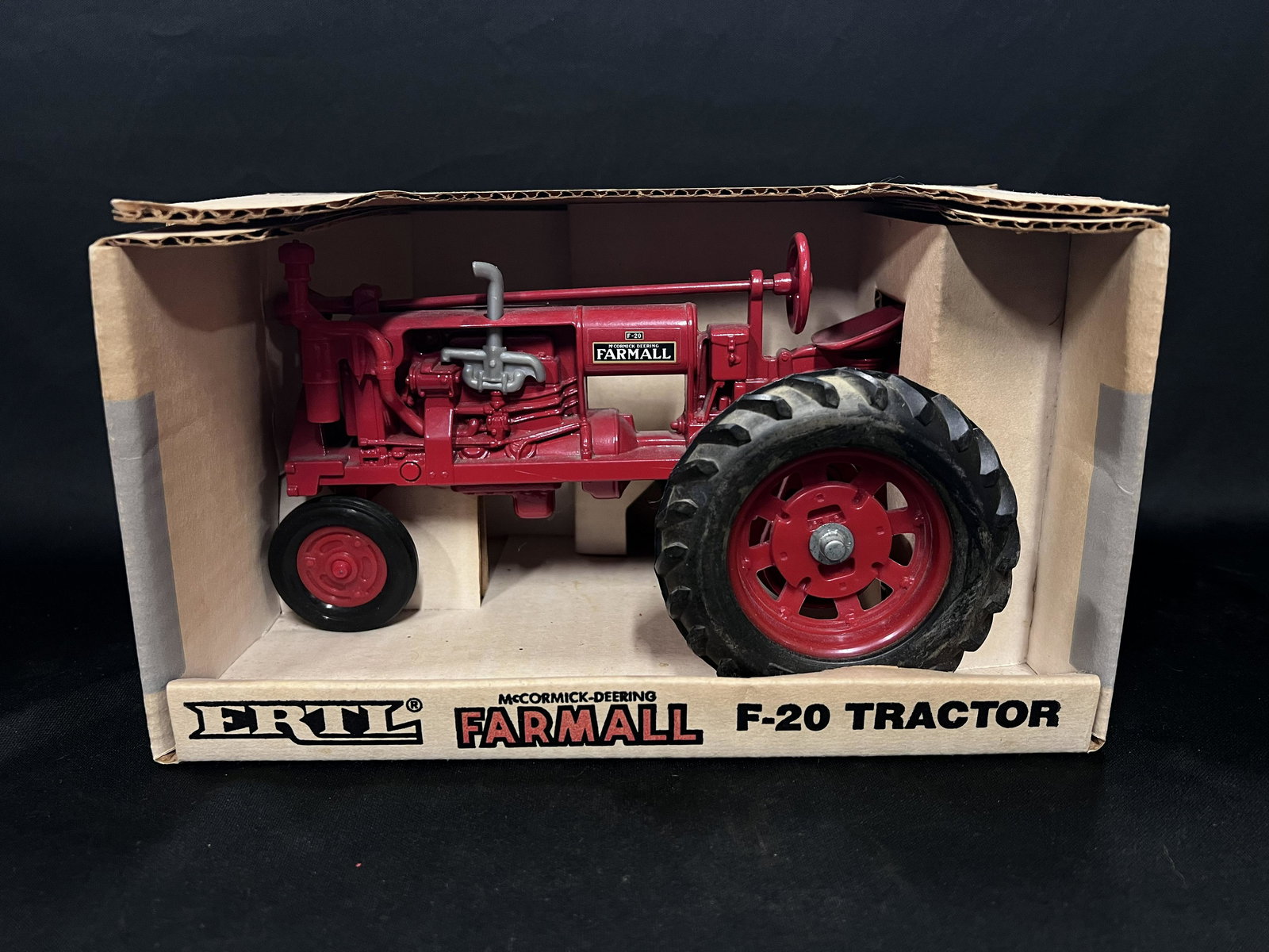 ERTL McCormick-Deering Farmall F-20 Toy Tractor: 1/16 Scale Die Cast Metal toy tractor in new condition in the original box #437.