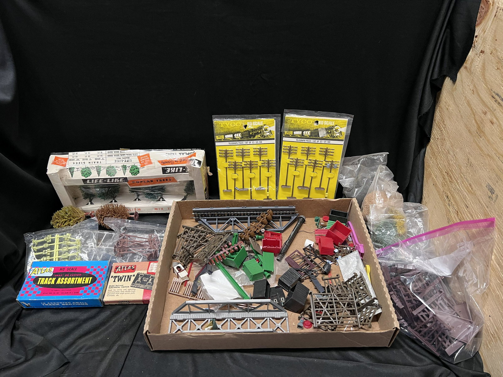 Large Group of Toy Train Accessories includes Signs, Figurines, Poles, Trees, and More. (1 of 8)