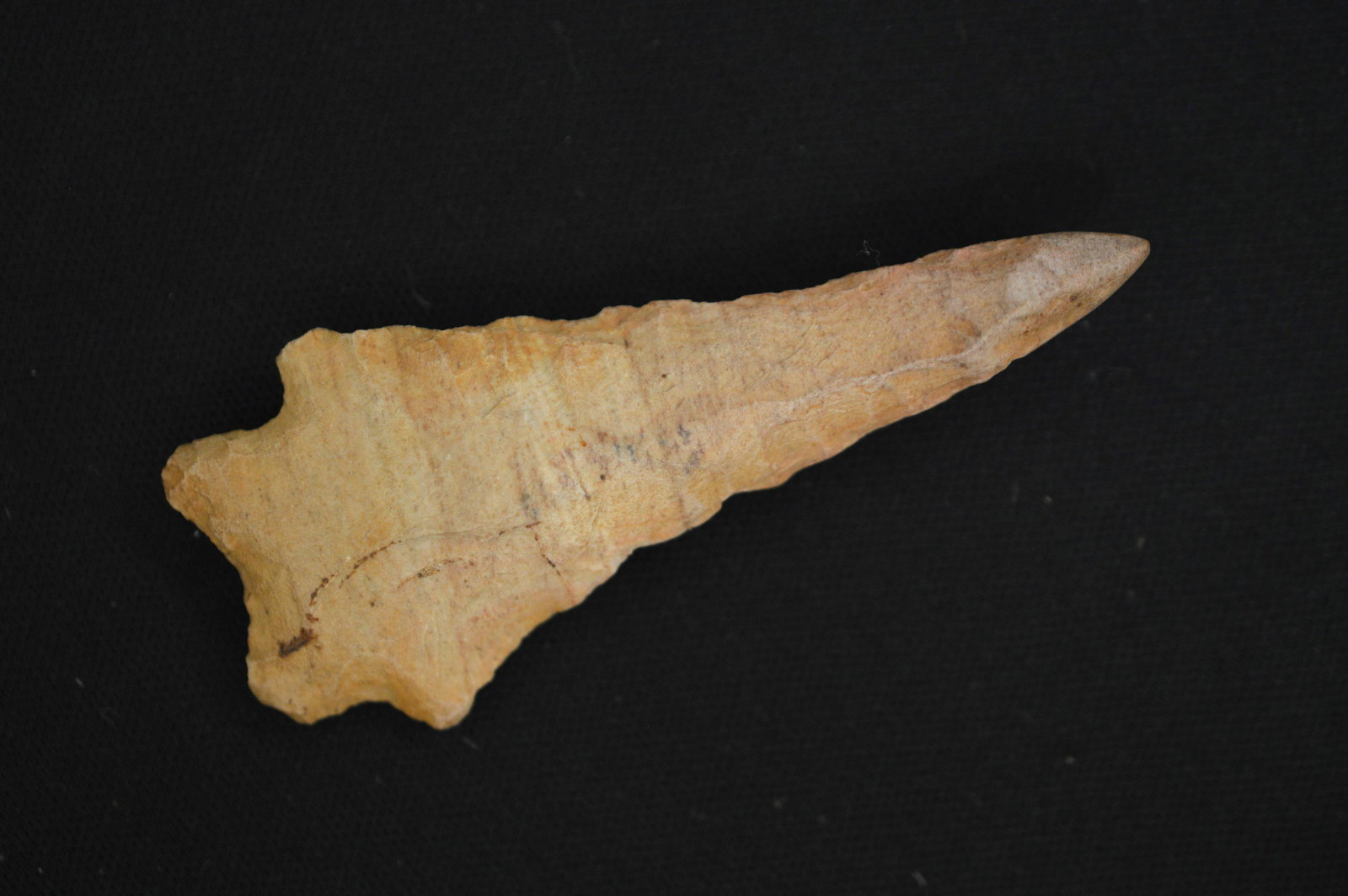 Kirk Stemmed 2 11/16" Arrowhead with a Polished Tip found in Tennessee Ex: Glen Haskins collection. (1 of 9)
