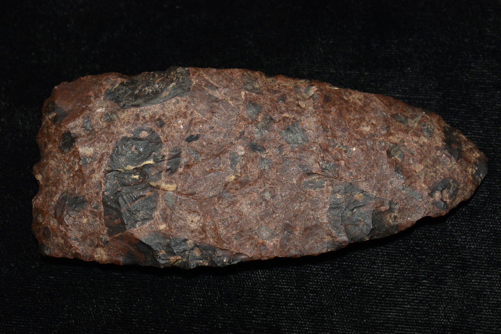 4 9/16" Conglomerated Mozarkite Gouge found in Pettis Co., Mo w/ Motley COA: 4 9/16" Conglomerated Mozarkite Gouge found in Pettis Co., Mo w/ Motley COA. This is a rare form of Mozarkite in this color and a very well made piece. Ex George Wolf Collection
