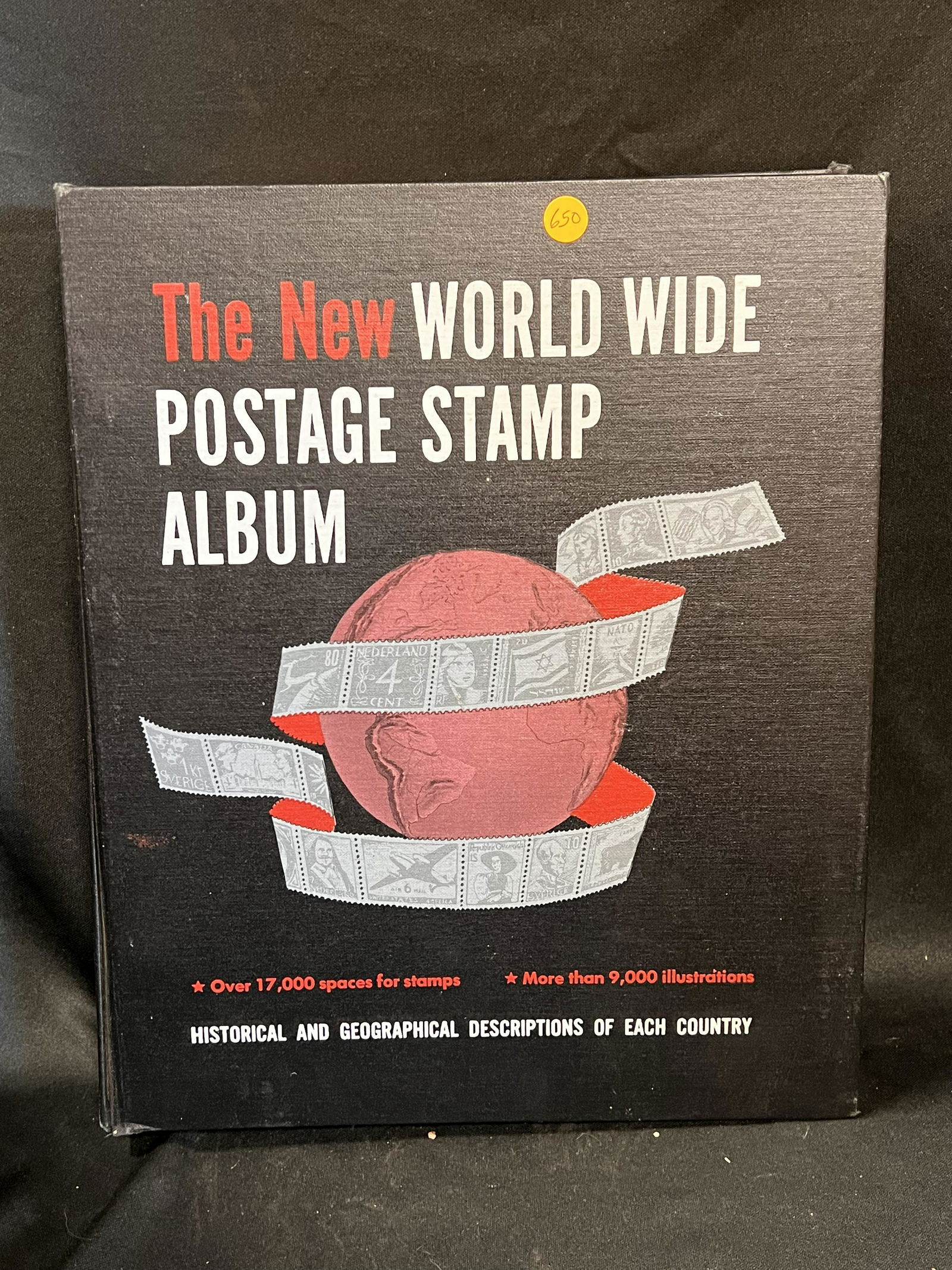 The New World Wide Postage Stamp Album with several stamps already added to the album.  376 pages. (1 of 10)