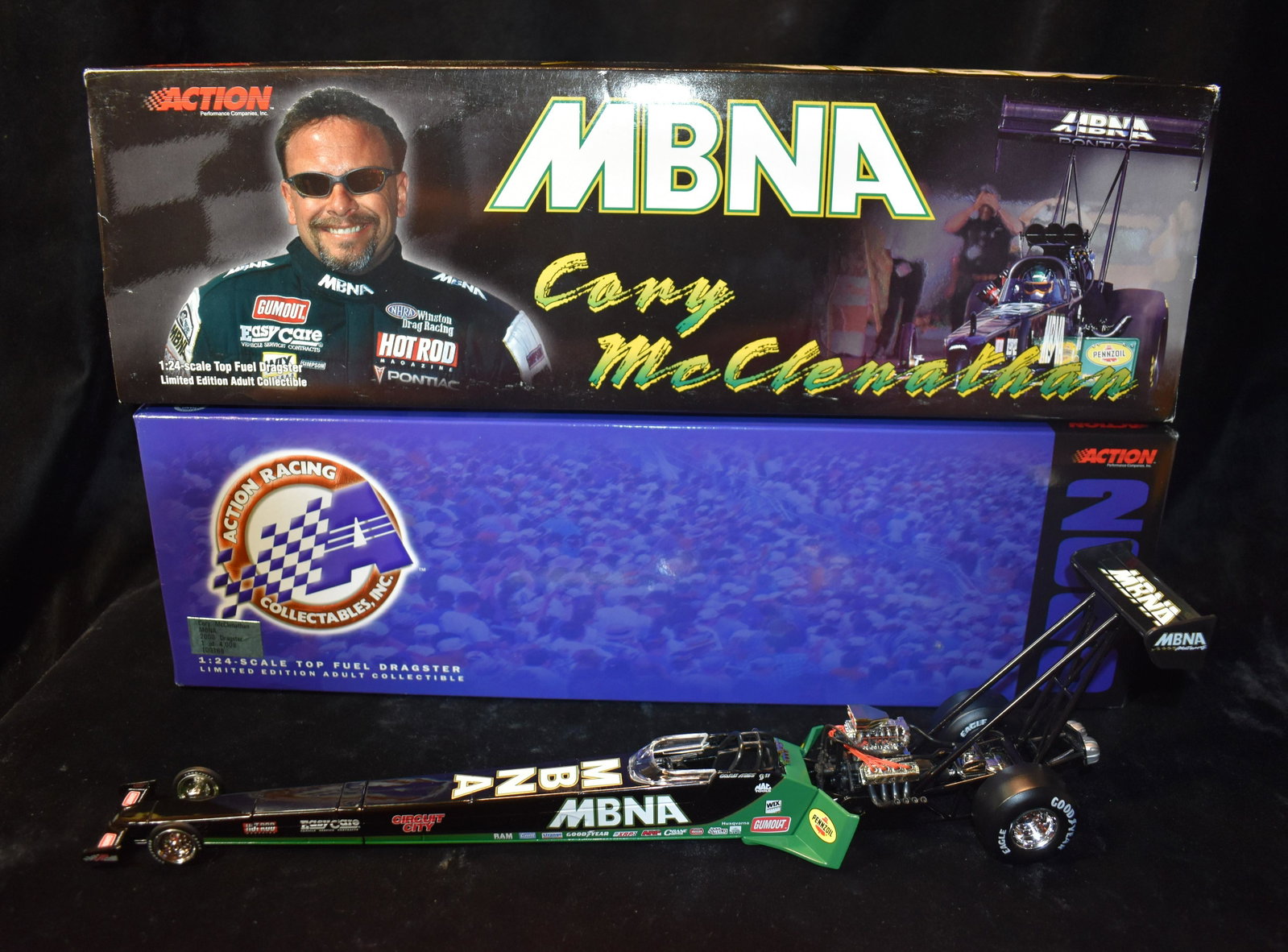 Top Fuel Dragster 2000 MBNA 1:24 Scale Diecast Car. ACTION PERFORMANCE COMPANIES: Top Fuel Dragster 2000 MBNA 1:24 Scale Diecast Car. ACTION PERFORMANCE COMPANIES. Cory McClanathan driver. New in its original box.