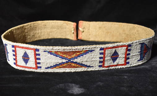 Outstanding 38" Plains Indian Beaded Belt Circa 1920's: Outstanding 38" Plains Indian Beaded Belt Circa 1920's. Excellent condition. Doesnt appear to have a bead out of place. The backing is some kind of heavy cloth. Measures 38 1/4" by 2 1/4"