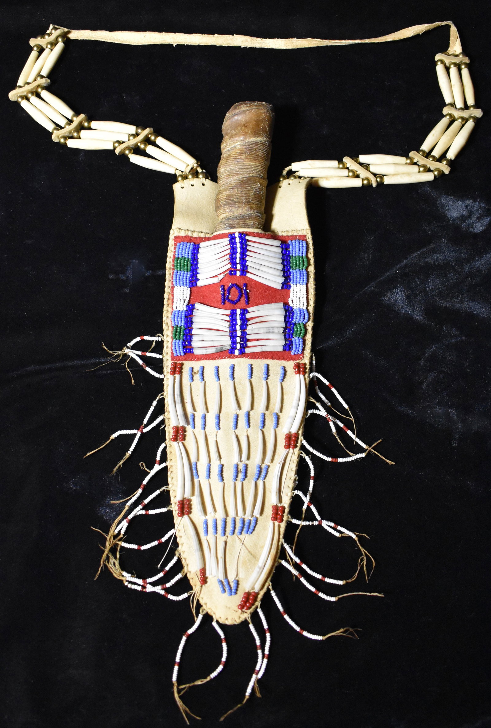 101 Wild West Show Beadwork Knife & Sheath Stage Prop: 101 Wild West Show Beadwork Knife & Sheath. This knife and sheath were reportedly a prop used in the 101 Shows in the early 1900's. It is in excellent condition. Very minor restoration needed as shown