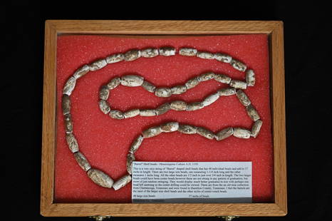 Strand of Barrel Shell Beads Mississippian Culture 48 total beads 37 inches length in a wood 8 1/2": Strand of Barrel Shell Beads Mississippian Culture 48 total beads 37 inches length in a wood 8 1/2" x 10 1/2" display case. Found in Hamilton Co. Tennessee.