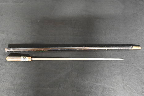 Sword Cane with Lions Head. 35 1/2" Long.  Twist the brass nut at the handle and the cane releases: Sword Cane with Lions Head. 35 1/2" Long. Twist the brass nut at the handle and the cane releases the handle allowing you to pull the sword out. Very rare and cool item.