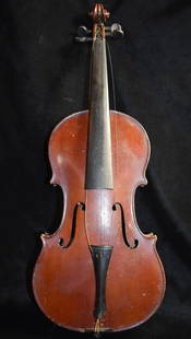 Early 1900's Stradivarius Style Copy of Josef Guarnerius Violin Made in Germany: Antique Violin Copy of Josef Guarnerius Made in Germany. Good restoration candidate. The wood is still intact without any noticed cracks but she could use a new staining. Tail piece has a chip out of