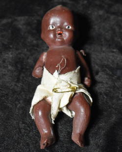 Early 1900's African American Bisque Baby Doll made in Japan 1921 to 1947: Early 1900's African American Bisque Baby Doll made in Japan 1921 to 1947. Excellent condition for its age. Black Americana. Measures about 4 3/4"