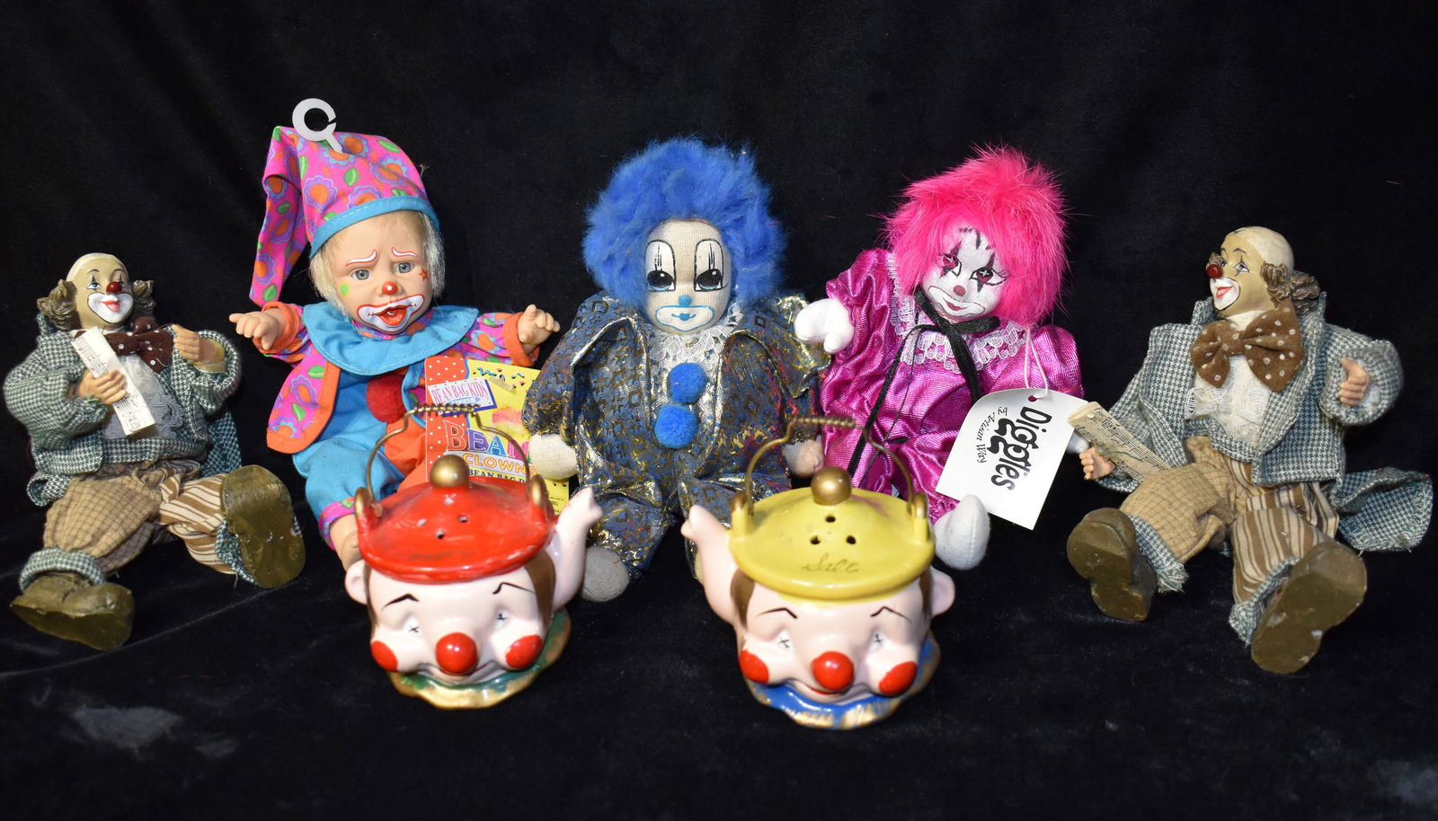 2 Clown Salt Shakers & 5 Porcelain Bisque, Sandbag, Beanie Bag and Resin Clown Figurines: 2 Clown Salt Shakers & 5 Porcelain Bisque, Sandbag, Beanie Bag and Resin Clown Figurines. Many if not most are vintage. Overall excellent condition. Minor tare on the back left shoulder of the clown o