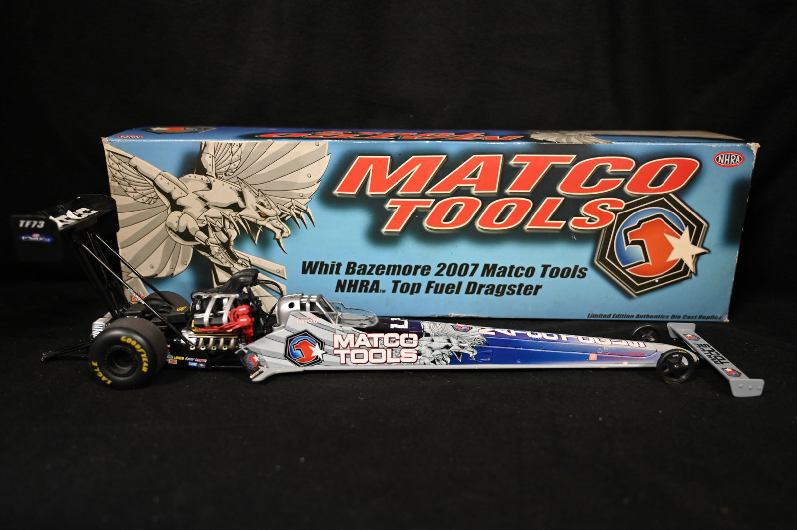 2007 Whit Bazemore " Matco Tools" NHRA 1:24 Scale Die Cast Top Fuel Dragster by Racing Champions: 2007 Whit Bazemore " Matco Tools" NHRA 1:24 Scale Die Cast Top Fuel Dragster by Racing Champions Authentics. The dragster and box are in brand new condition.