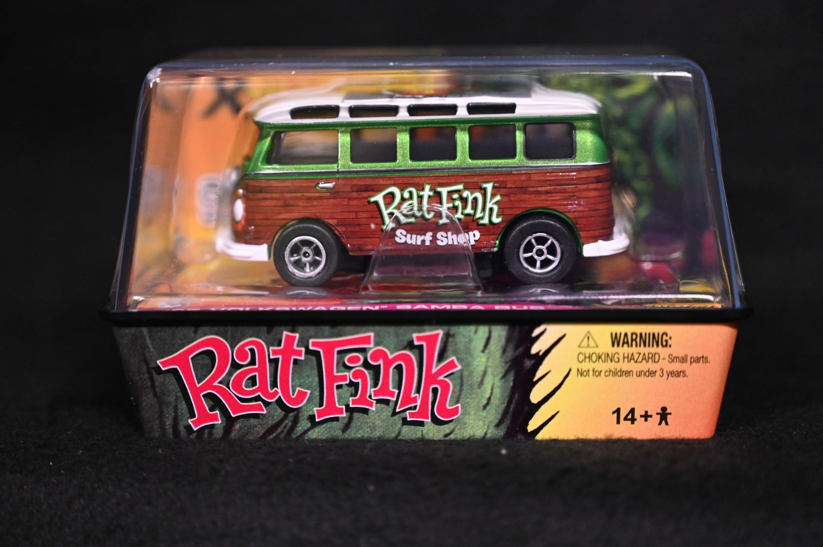 Auto World Rat Fink XTraction Ultra-G 65 Volkswagen Samba Bus Green. No.60. Brand new unopened slot: Auto World Rat Fink XTraction Ultra-G 65 Volkswagen Samba Bus Green. No.60. Brand new unopened slot racing diecast car in mint condition produced in 2011. Character created by Ed "Big Daddy" Roth.