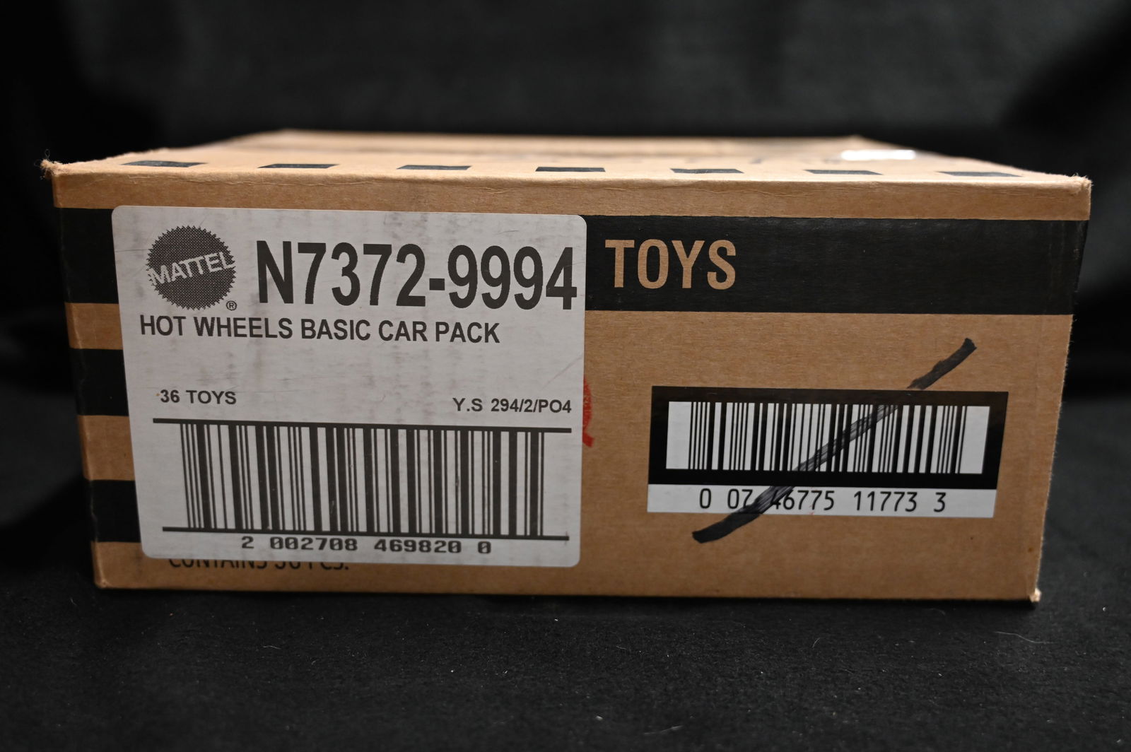 Hot Wheels 36 Cars Assortment Box by Mattel: Mattel Hot Wheels Assortment contains 36 cars. We use a stock photo of an open box as reference to what's in the box. The cars in the photo are not the exact cars in the box. All cars are brand new an