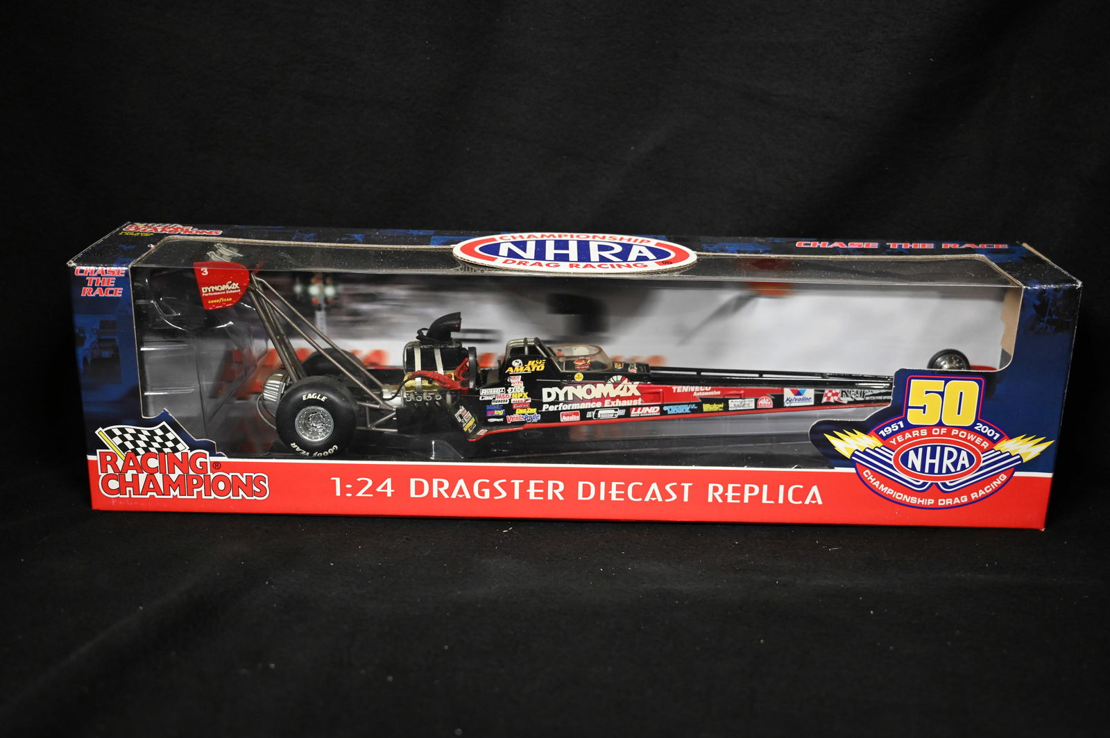 2001 Joe Amato "Dynomax" NHRA 50 Years of Power 1:24 Scale Dragster Diecast Replica by Racing: 2001 Joe Amato "Dynomax" NHRA 50 Years of Power 1:24 Scale Dragster Diecast Replica by Racing Champions. The dragster and box are in brand new condition.