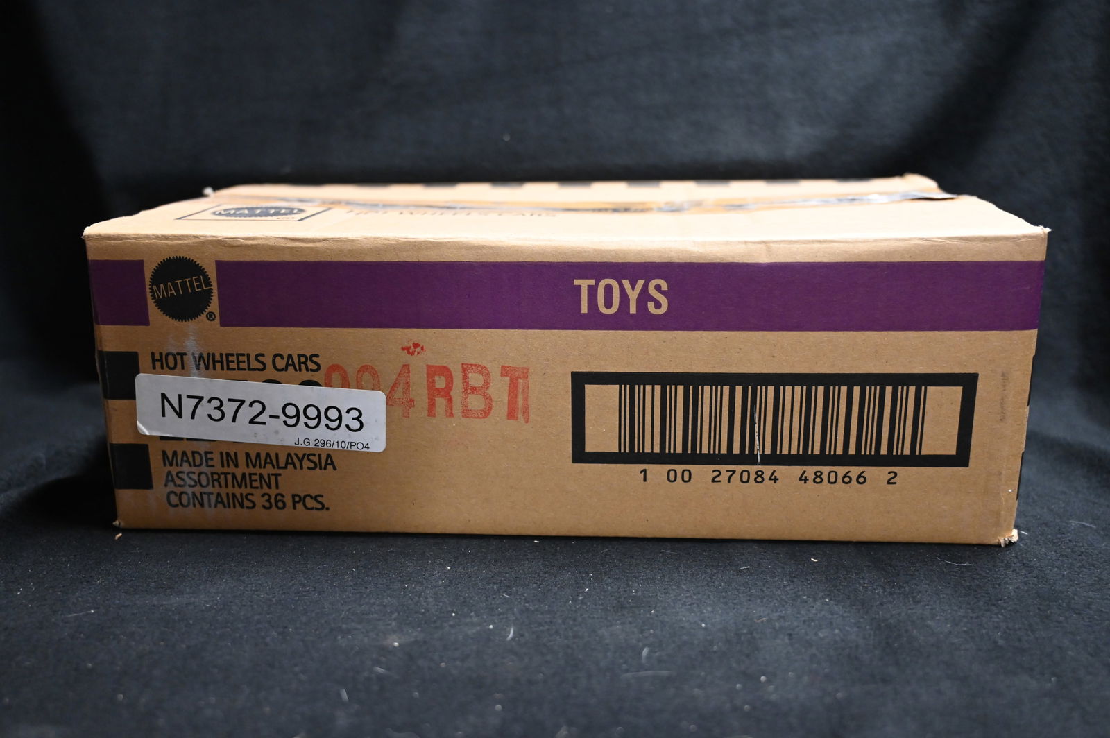 Hot Wheels 36 Cars Assortment Box by Mattel: Mattel Hot Wheels Assortment contains 36 cars. We use a stock photo of an open box as reference to what's in the box. The cars in the photo are not the exact cars in the box. All cars are brand new an