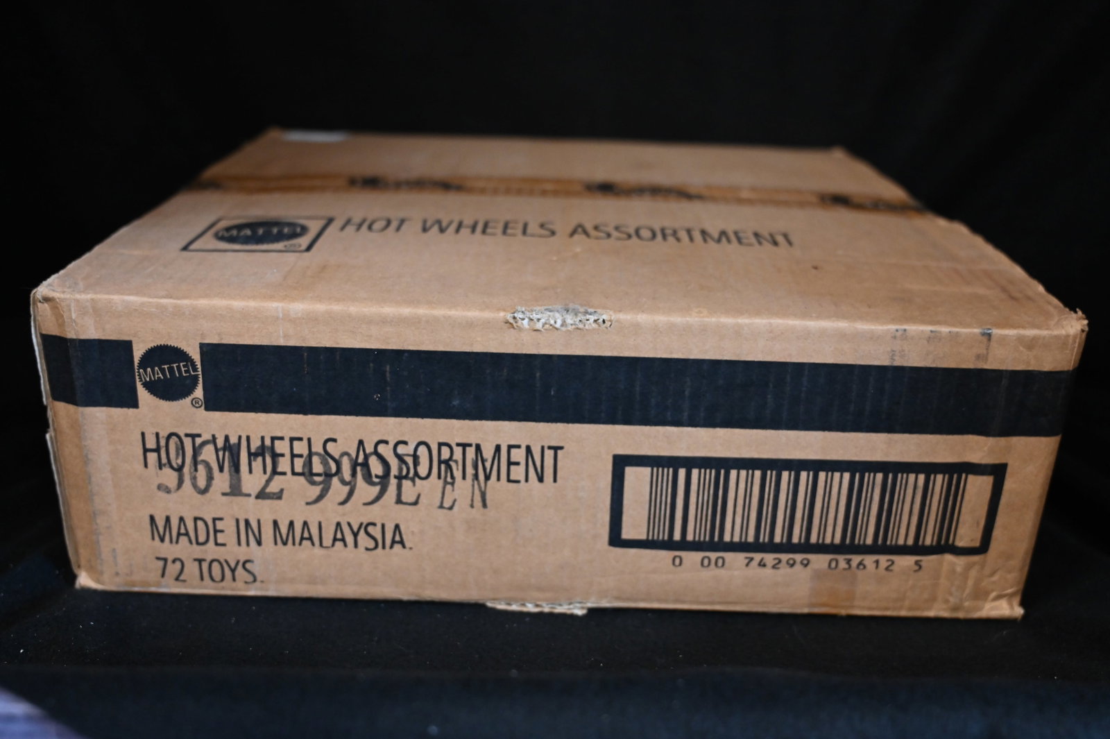 Hot Wheels 72 Cars Assortment Box by Mattel: Mattel Hot Wheels Assortment contains 72 cars. We use a stock photo of an open box as reference to what's in the box. The cars in the photo are not the exact cars in the box. All cars are brand new an