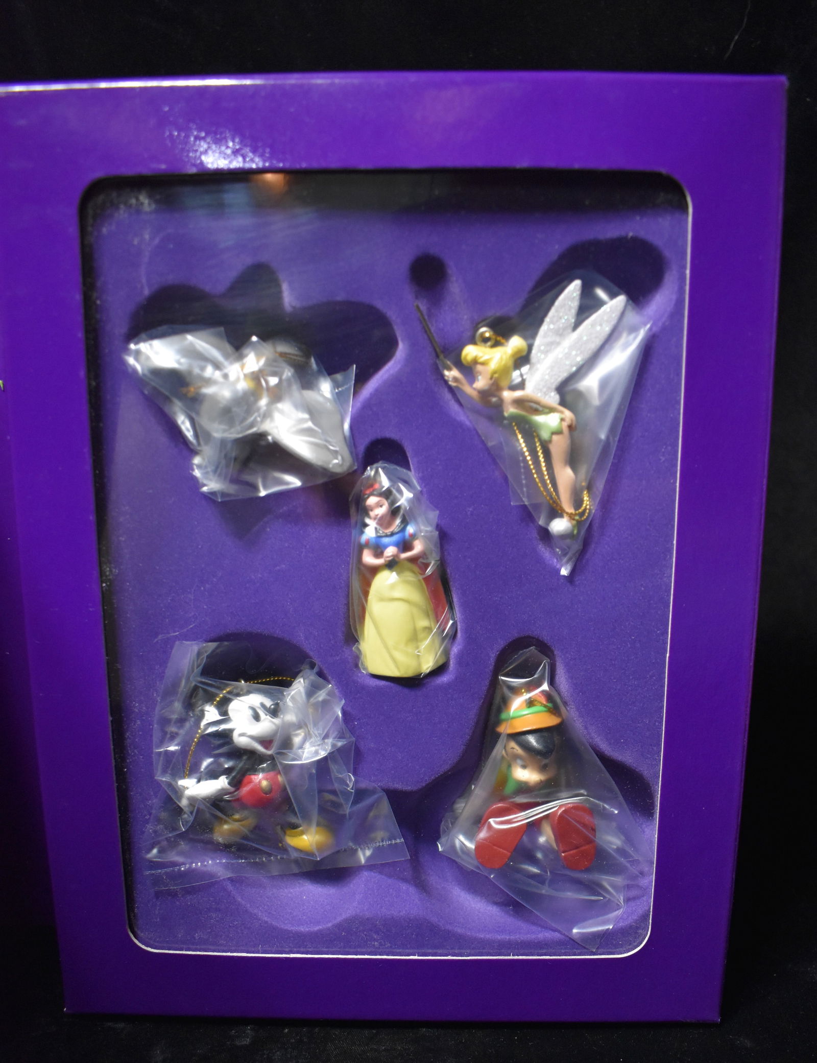 Walt Disney Storybook Ornament Set 75 Years Of Love & Laughter Mickey: Walt Disney Storybook Ornament Set 75 Years Of Love & Laughter Mickey. New condition in their original box. Snow White, Mickey Mouse, Tinkerbell, Dumbo the Elephant and Pinocchio.
