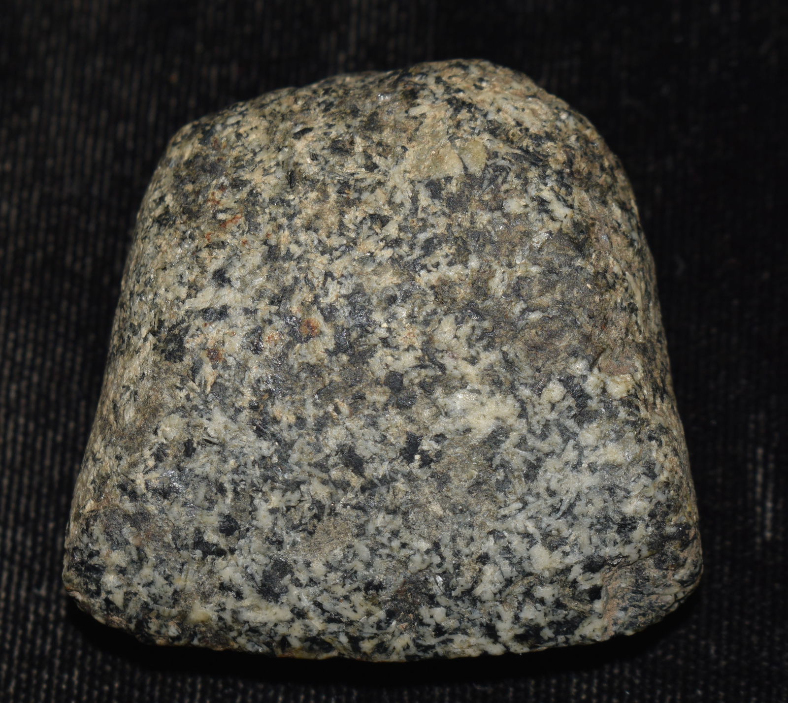 1 5/8" Speckled Granite Miniature Axe found in Illinois: 1 5/8" Speckled Granite Miniature Axe found in Illinois. Ex Matt Lay Collection.