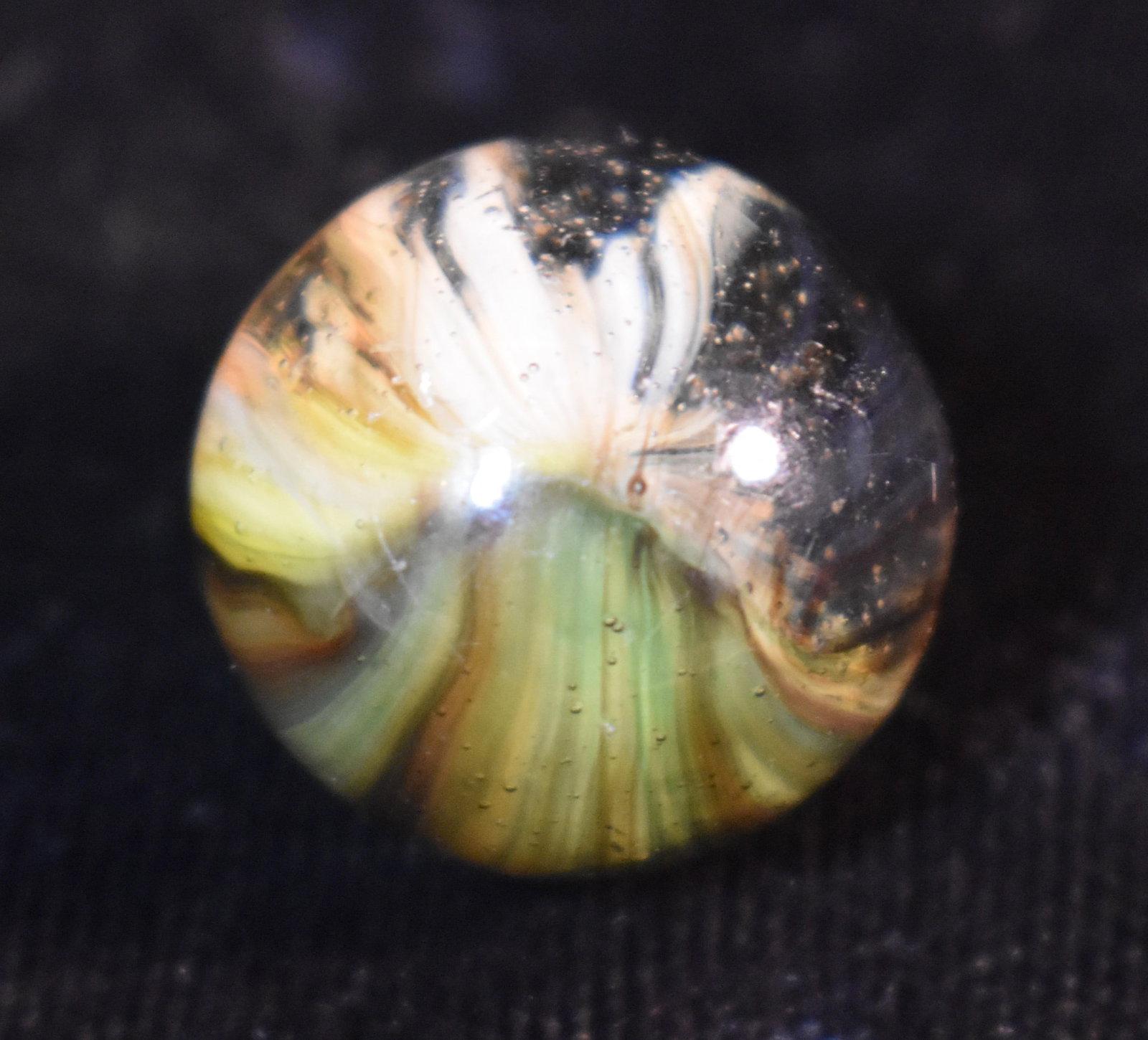 Very Old Gorgeous Sparkler Marble: Only found a couple hit marks on it from game play. At first glance it looks much like an onionskin but It doesn't have the nipple or indention on the top from handmade manufacture. Early machine marb