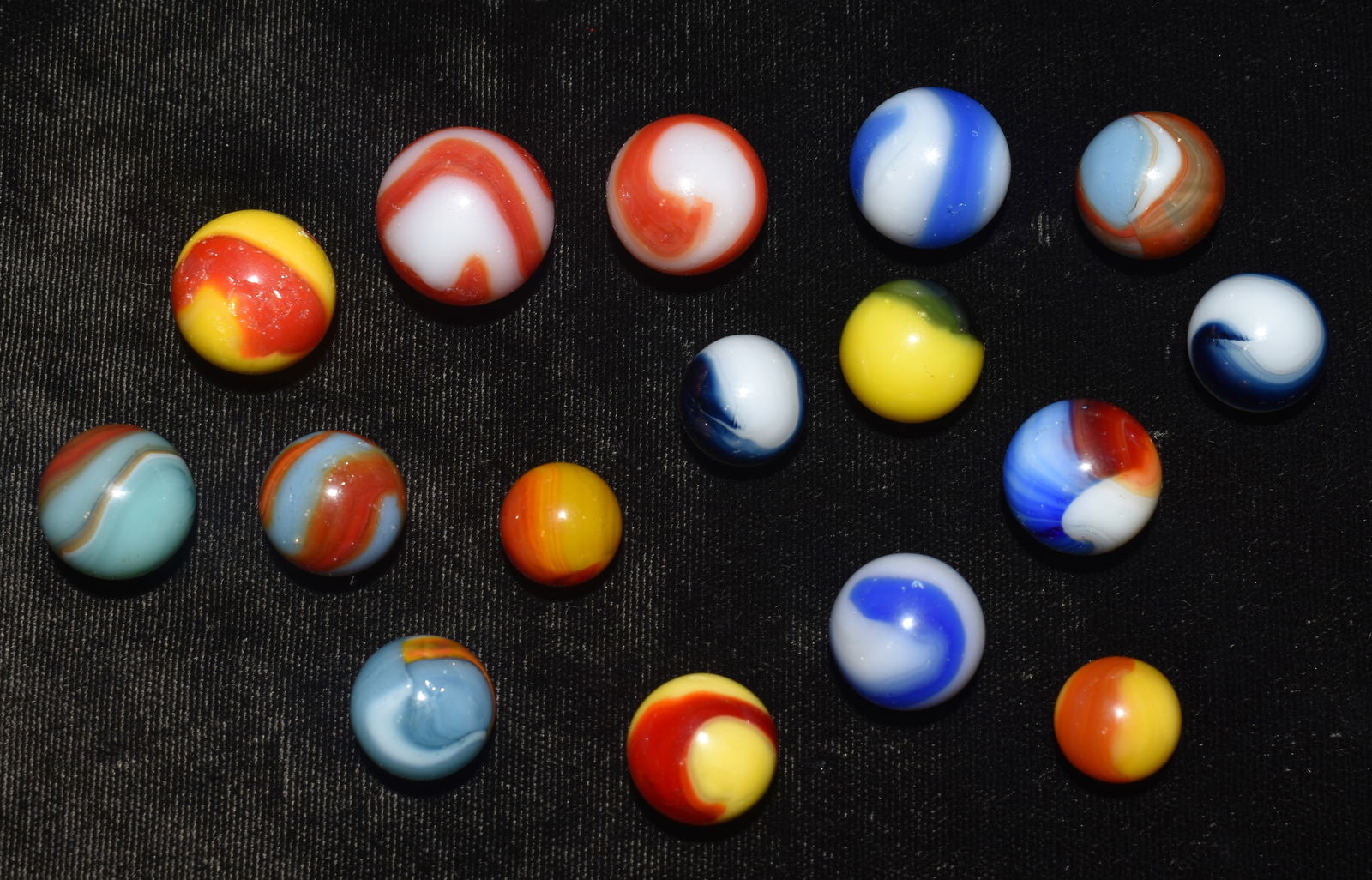 16 Akro Agate Marbles - Mostly Corkscrews.  Condition varies from mint to a few hits from game play. (1 of 5)