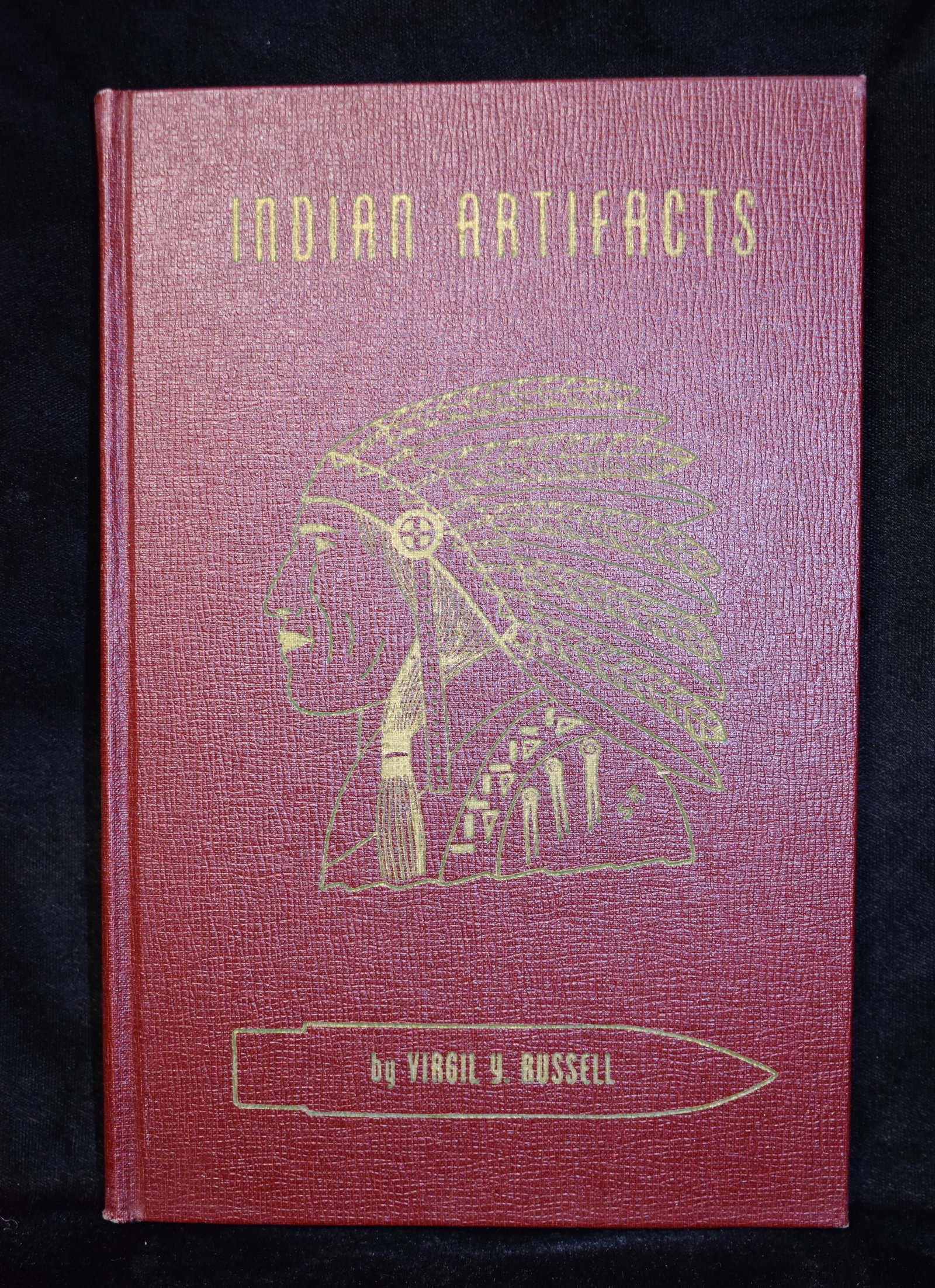 Indian Artifacts by Virgil Y. Russell 1953: Indian Artifacts by Virgil Y. Russell 1953. Published by Johnson Publishing Company Boulder Colorado 1953. Excellent condition hardback. Dust cover has a bit of wear.