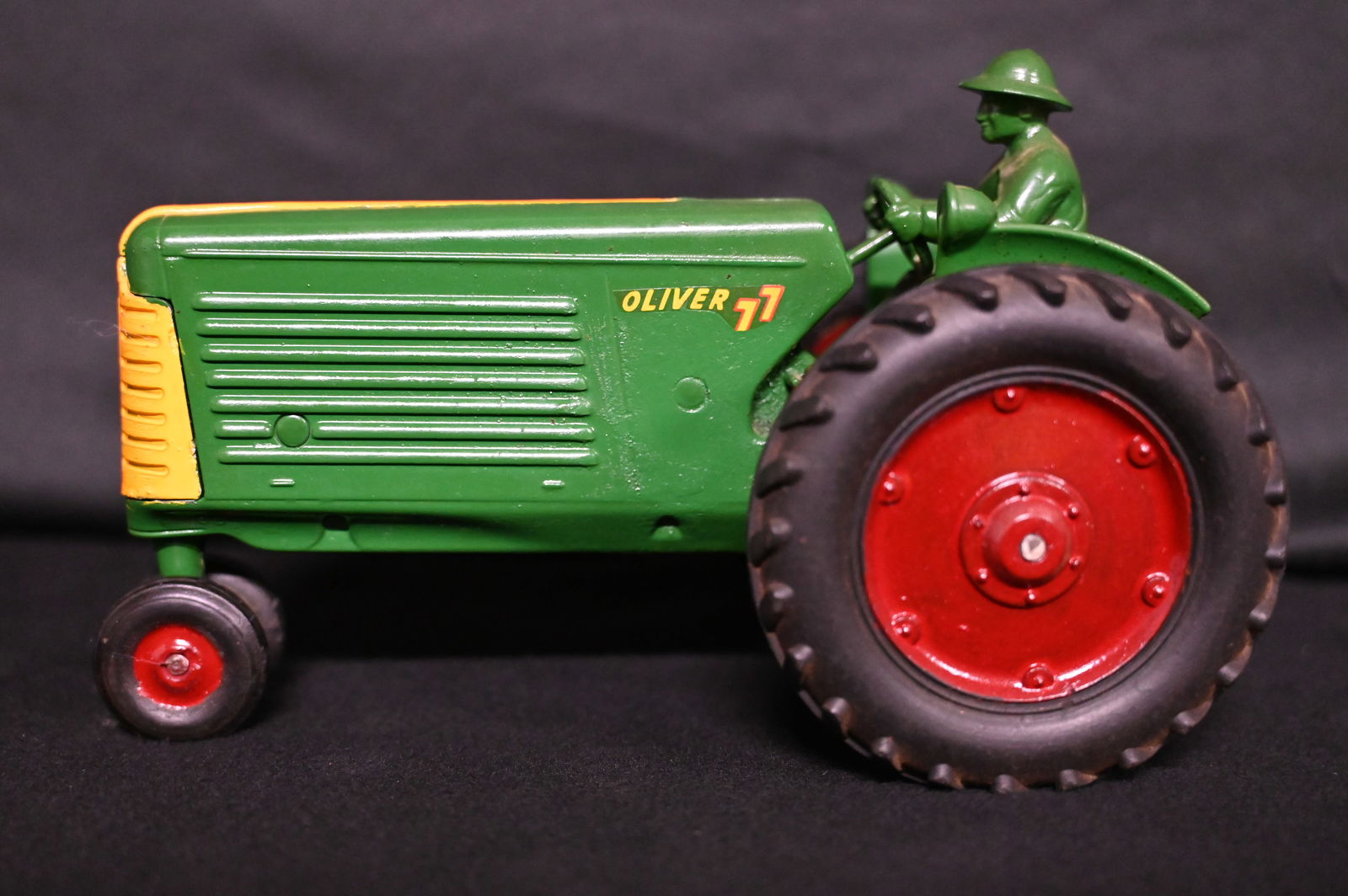 Oliver 77 Die Cast Tractor with Rider 5" Tall 8" Wide ,no company identification on it. (1 of 6)