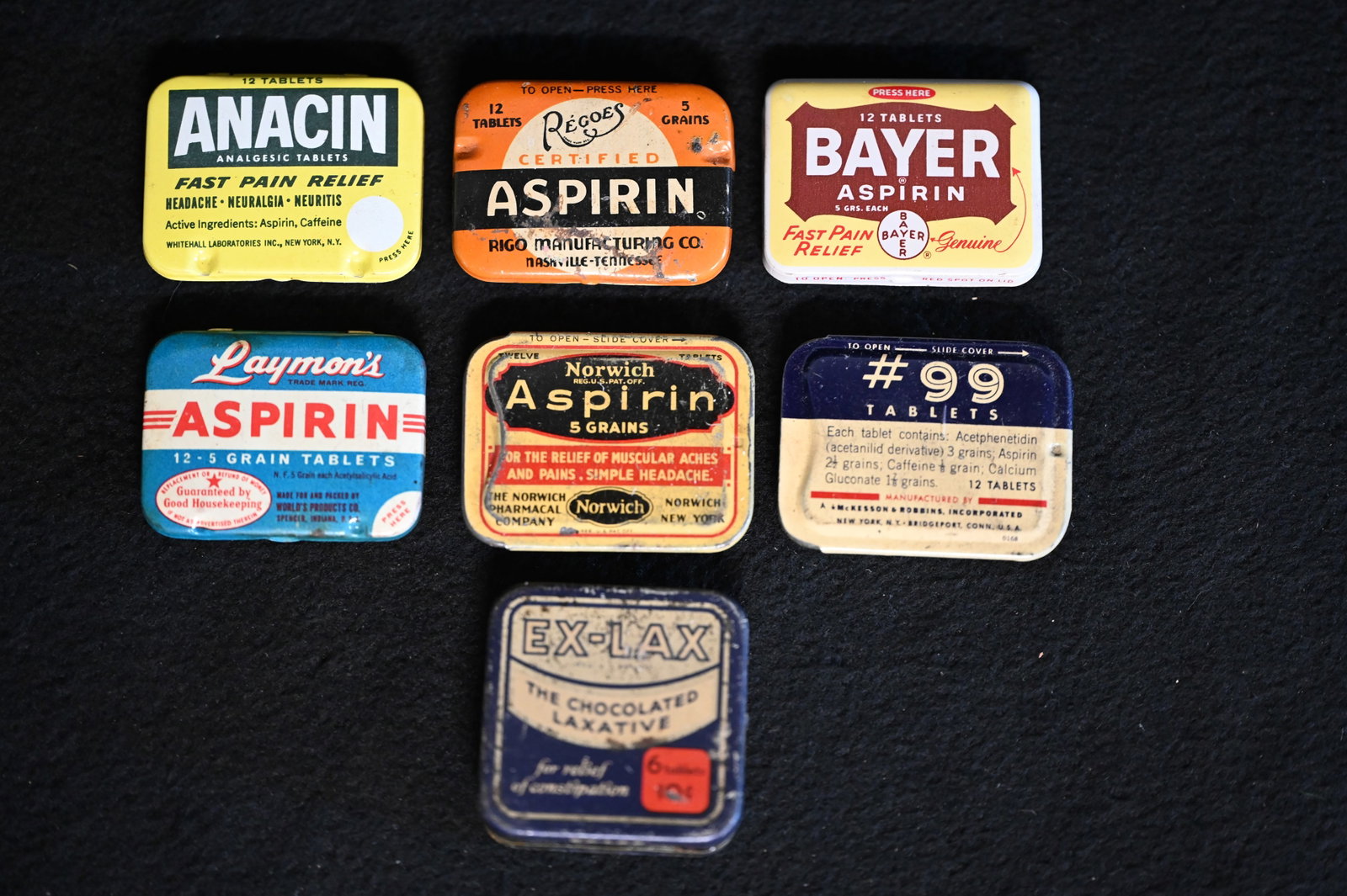 7 Metal Aspirin and EX-LAX Vintage Containers. Includes Laymon's , Norwich , Regoes , Anacin ,: 7 Metal Aspirin and EX-LAX Vintage Containers. Includes Laymon's , Norwich , Regoes , Anacin , Bayer , EX-LAX , #99. Some of them still have pills in them. Hard to find these in this kind of condition