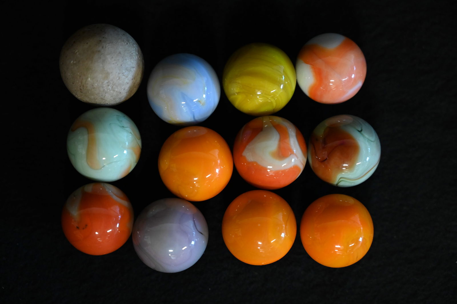 12 Large Shooter Marbles 1 1/16" is the largest. (1 of 3)