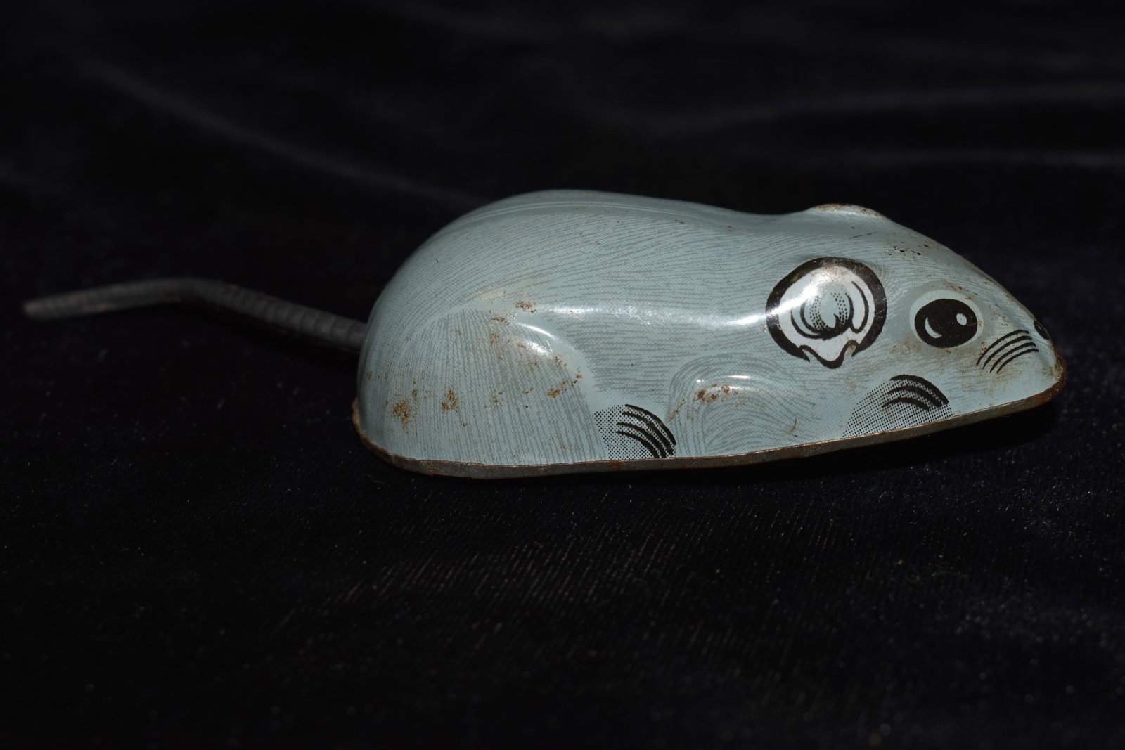 Tin Litho Friction Driven Mouse Mid Century Made in Japan: Tin Litho Friction Driven Mouse Mid Century Made in Japan. Has a little rust but still operates as it is supposed to. Measures over 5 inches counting the tail.