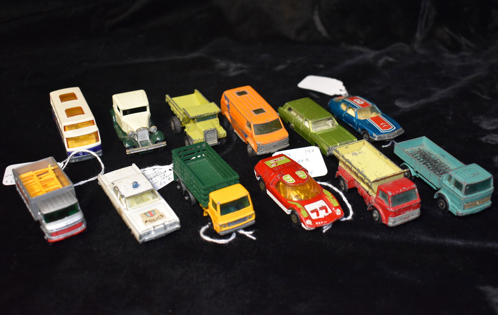 12 Matchbox Lesney Diecast Cars from the 1960' to early 1970's: 12 Matchbox Lesney Diecast Cars from the 1960' to early 1970's . All cars in this lot were someones toy they played with at some point long ago. Conditions vary. See photos. Many have tags on them fro